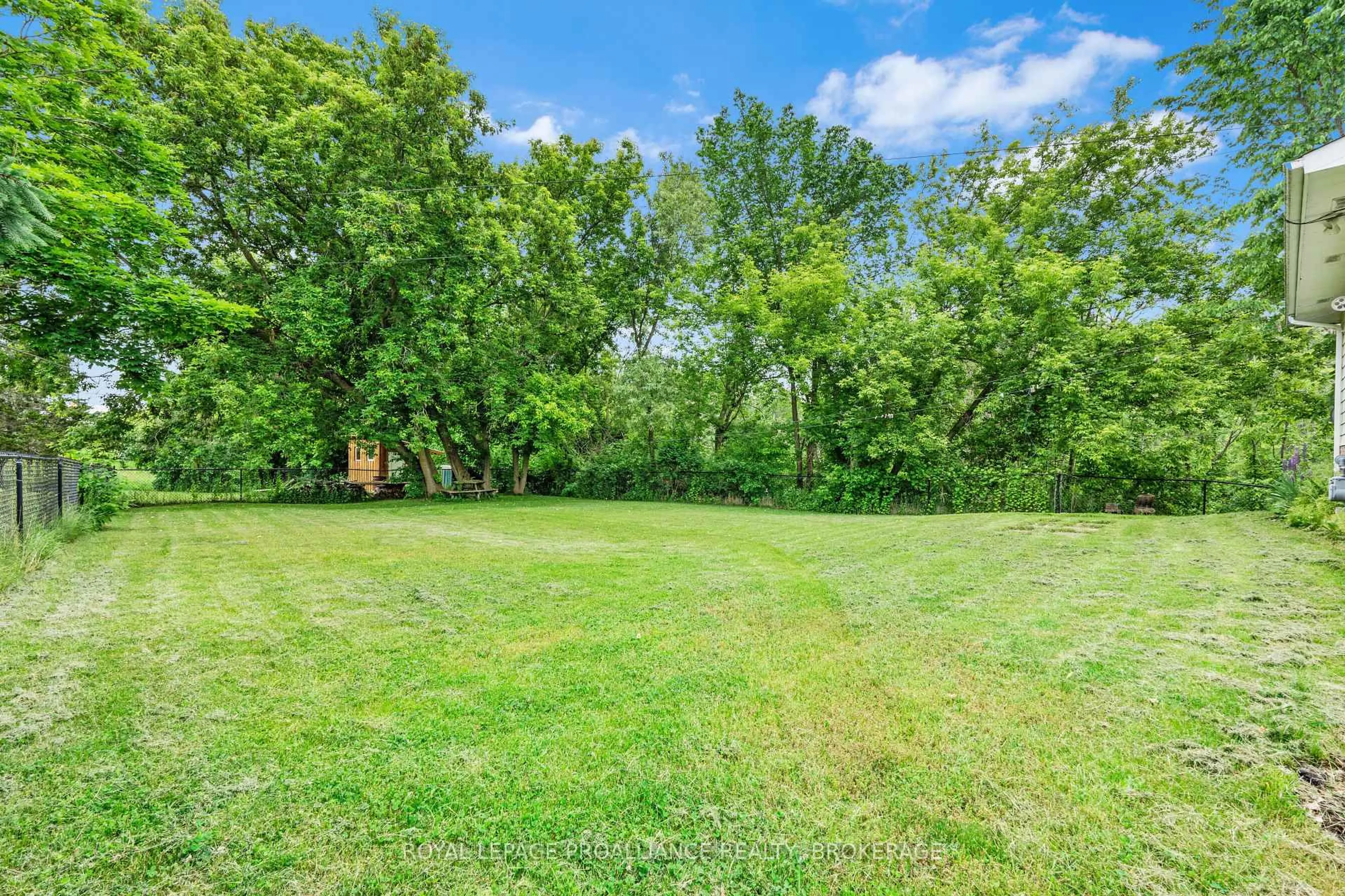 A pic from outside/outdoor area/front of a property/back of a property/a pic from drone, forest/trees view for 3519 Princess St, Kingston Ontario K7P 3A7