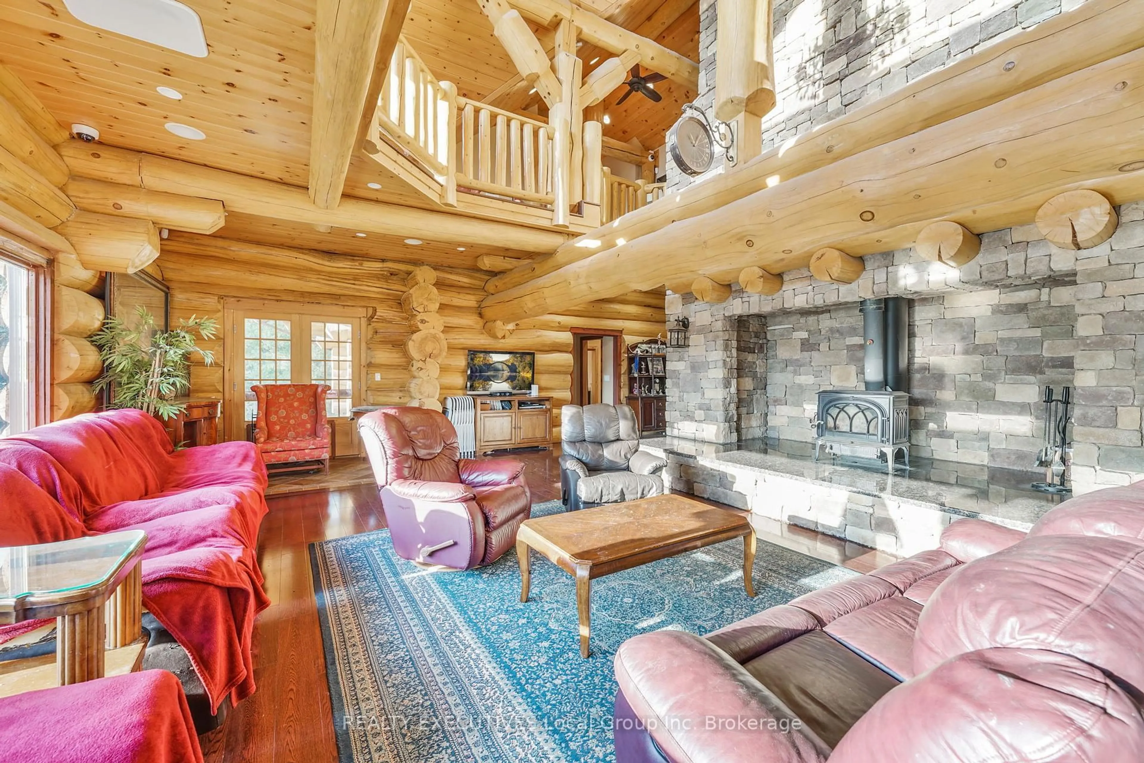 Living room with furniture, wood/laminate floor for 240 KANICHEE MINE Rd, Temagami Ontario P0H 2H0