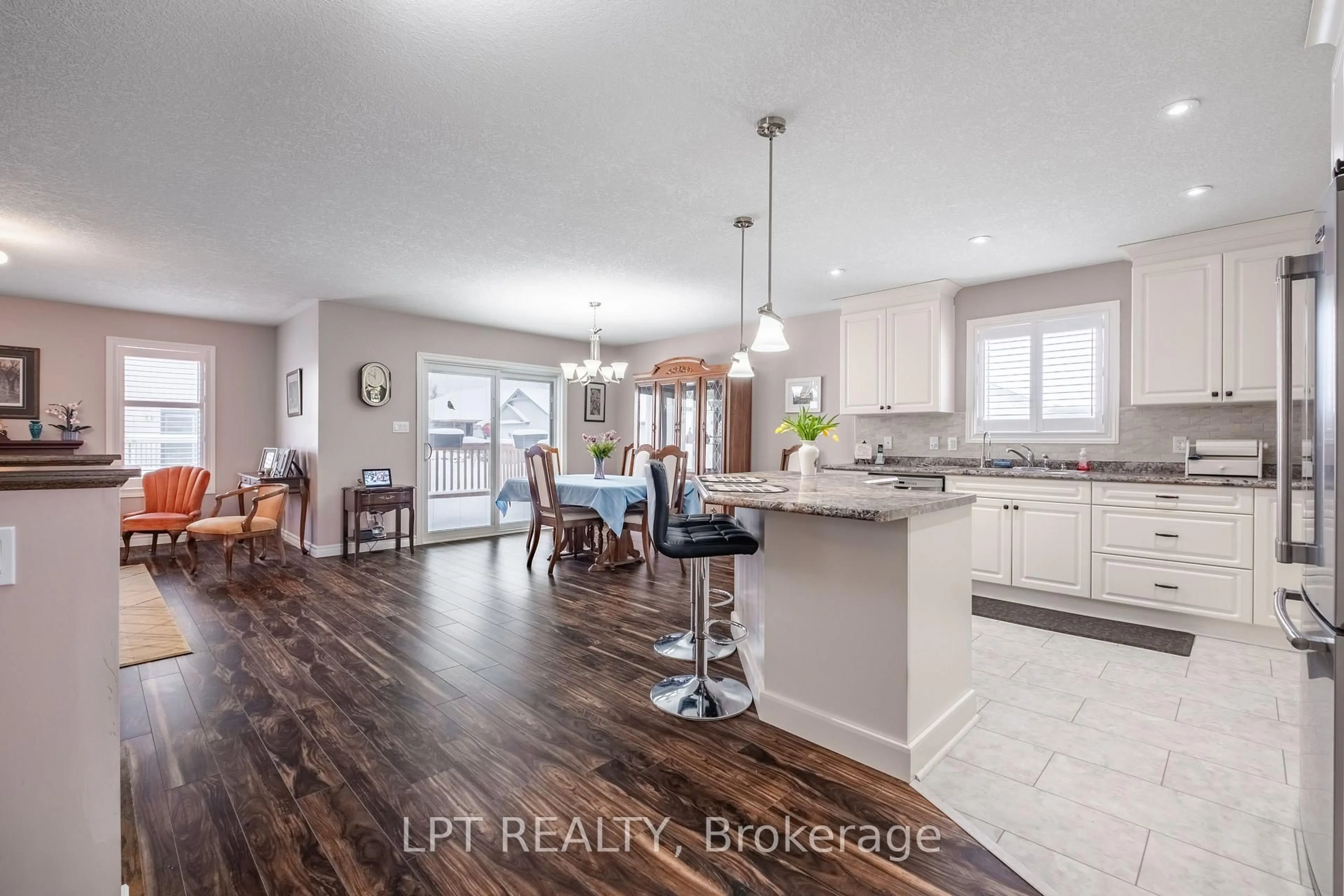 Open concept kitchen, wood/laminate floor for 2 Merrill Dr, Prince Edward County Ontario K0K 3L0