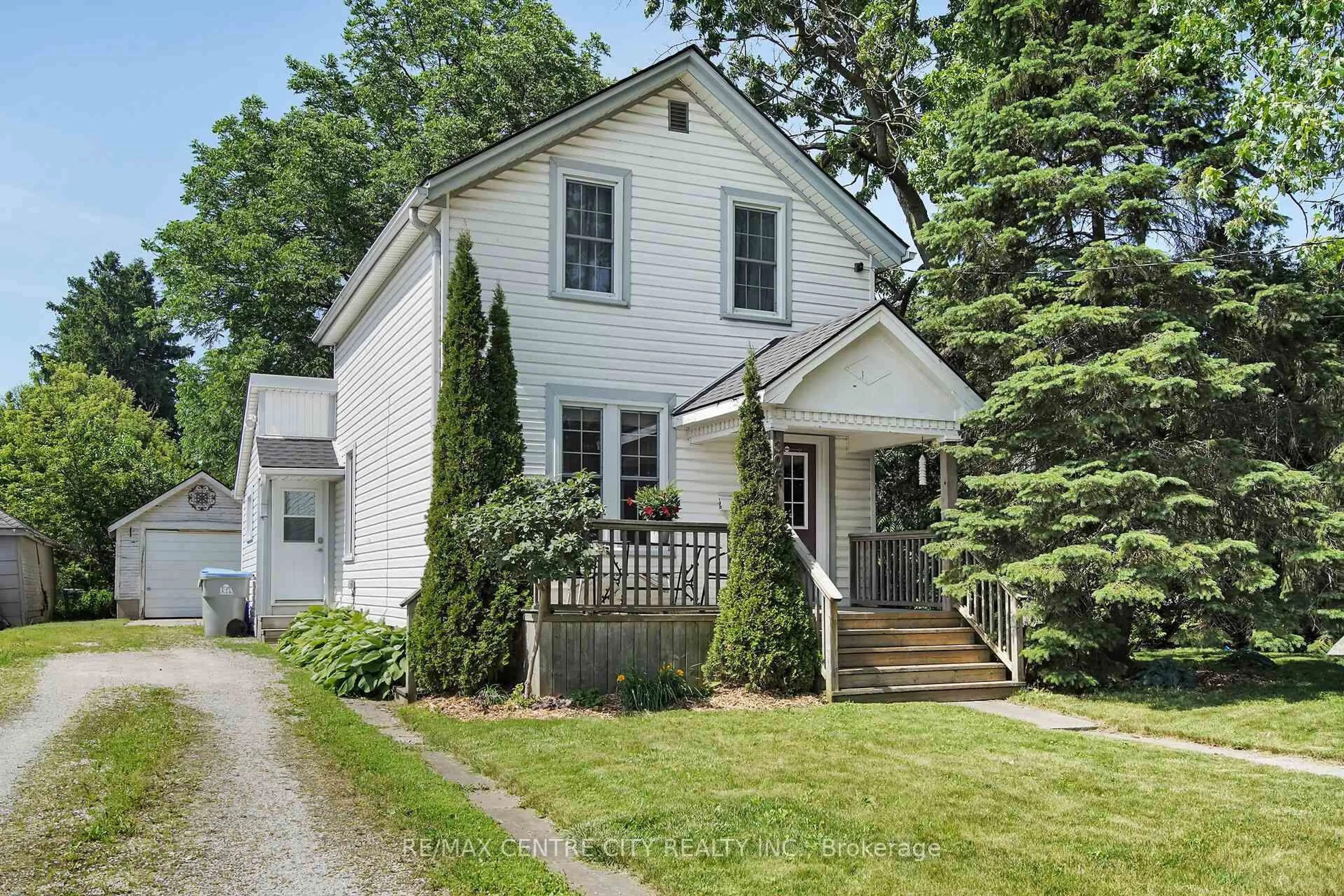 Home with vinyl exterior material, street for 306 George St, Middlesex Centre Ontario N0M 2A0
