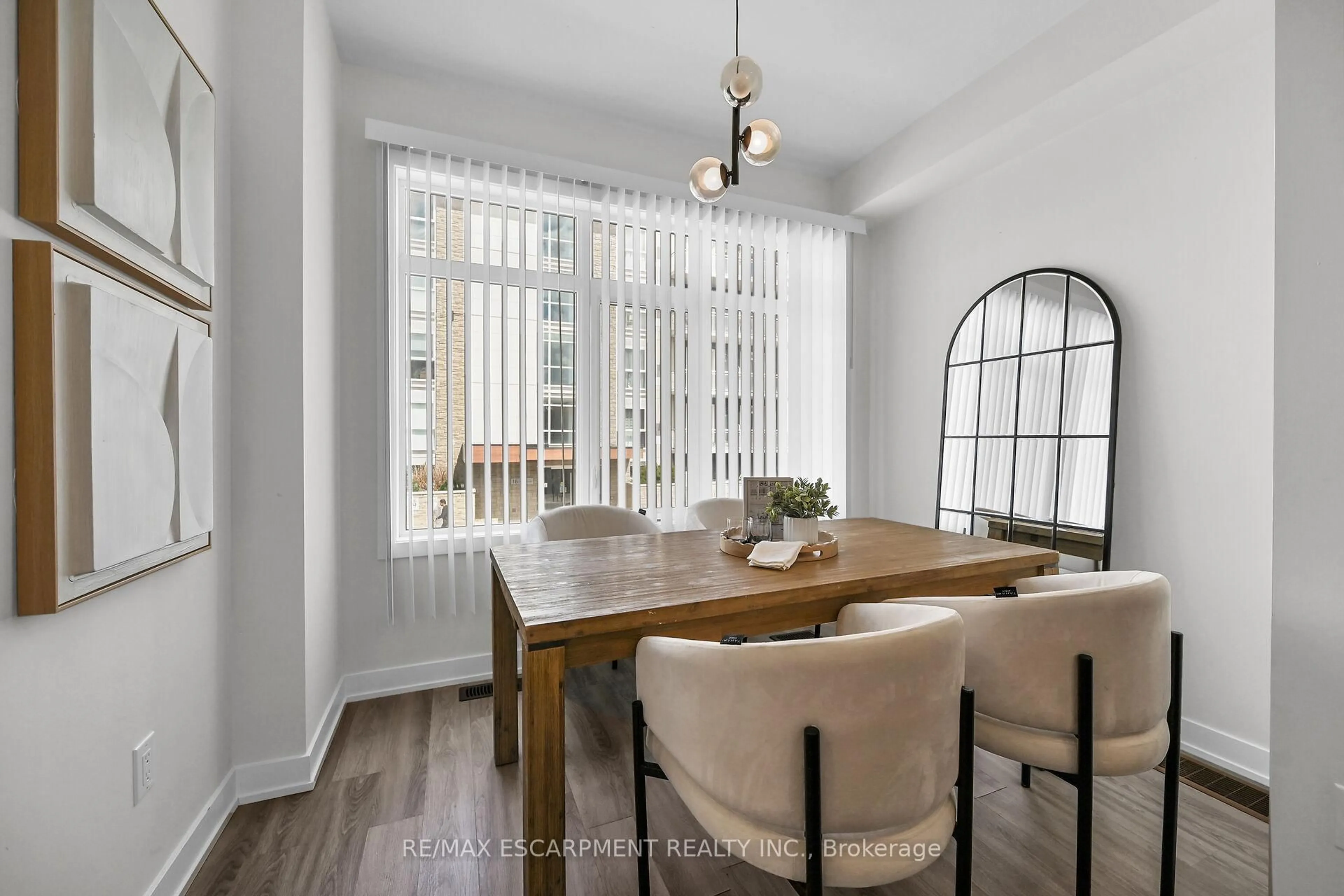Dining room, wood/laminate floor for 17 Markle Cres, Hamilton Ontario L9H 0H3