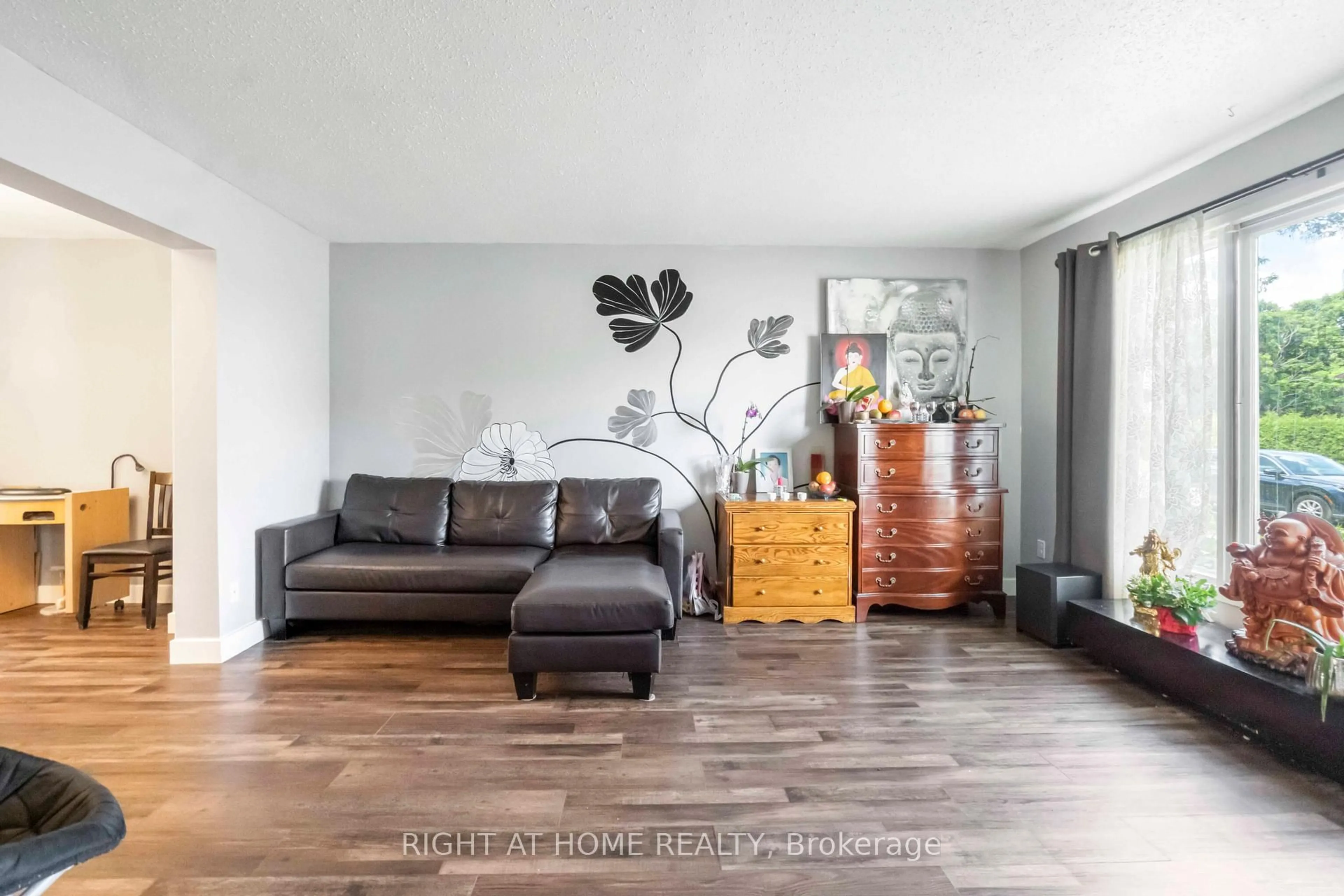 Living room with furniture, wood/laminate floor for 21 Midland Cres #3, Ottawa Ontario K2H 8P6
