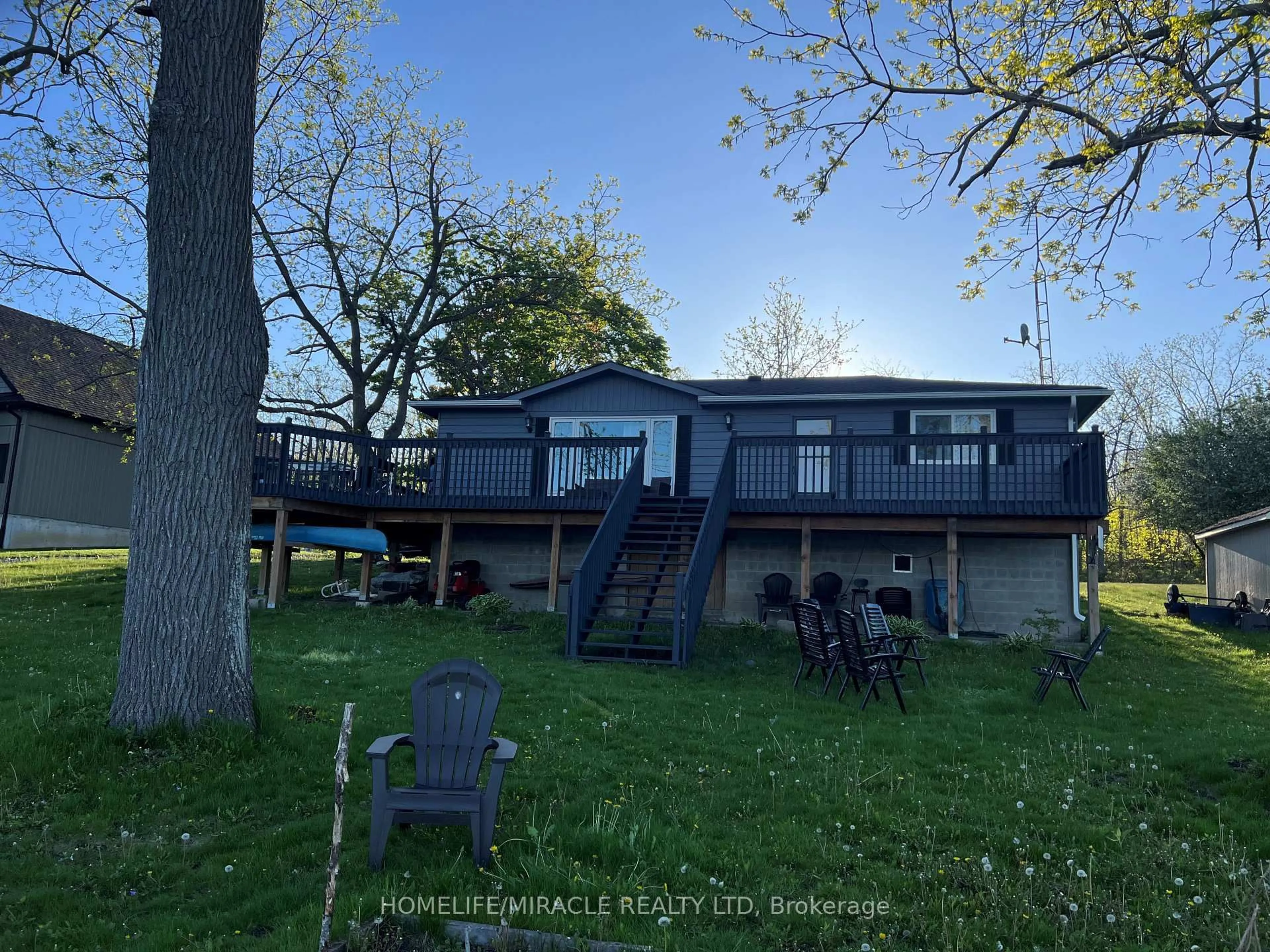 A pic from outside/outdoor area/front of a property/back of a property/a pic from drone, water/lake/river/ocean view for 30 Ivey Lane, Otonabee-South Monaghan Ontario K9J 6X8