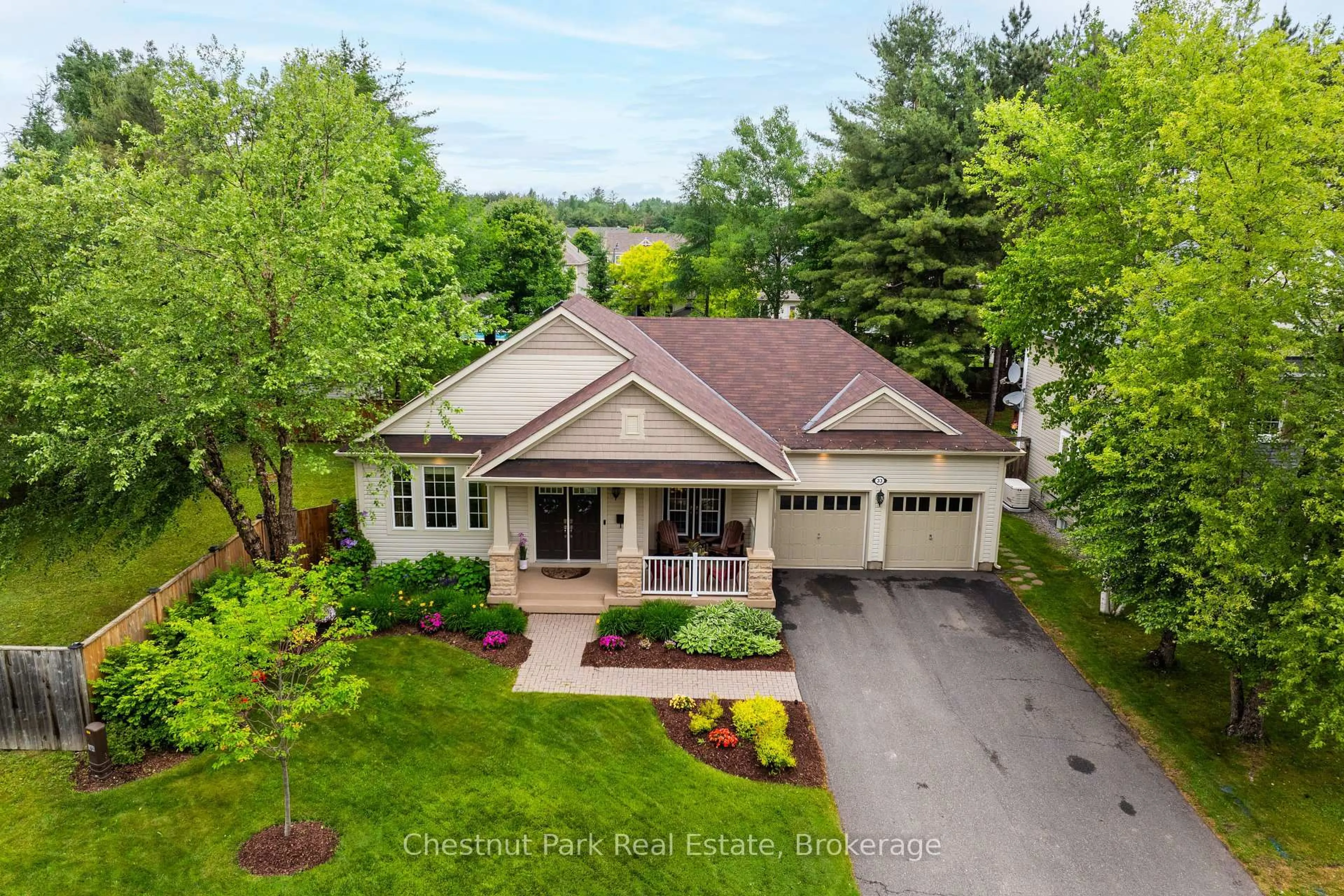A pic from outside/outdoor area/front of a property/back of a property/a pic from drone, street for 33 Clearbrook Tr, Bracebridge Ontario P1L 0A3