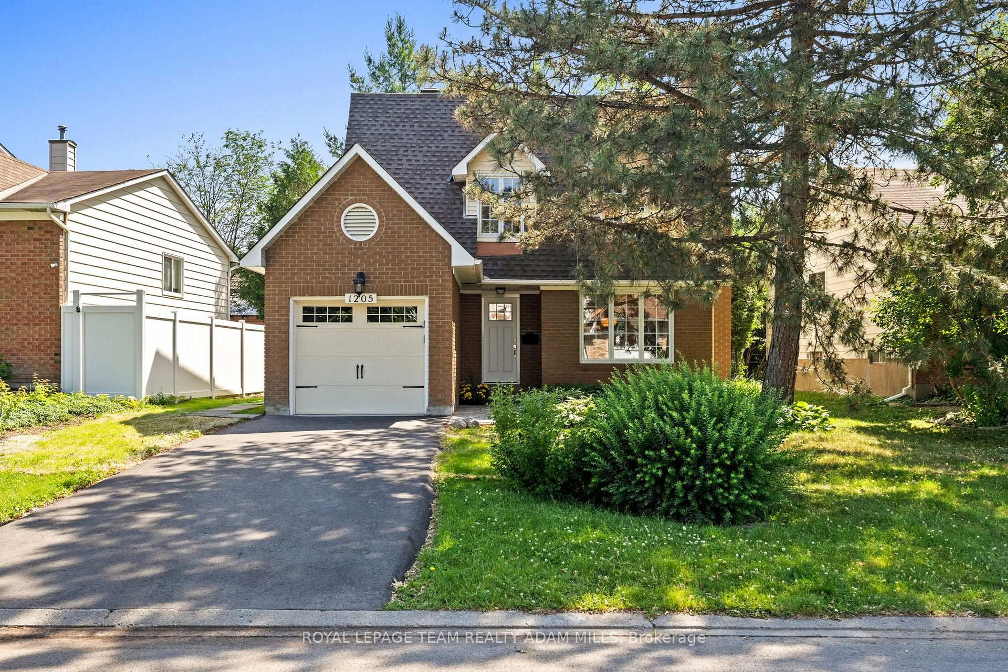 Home with brick exterior material, street for 1205 St. Moritz Crt, Ottawa Ontario K1C 2B2