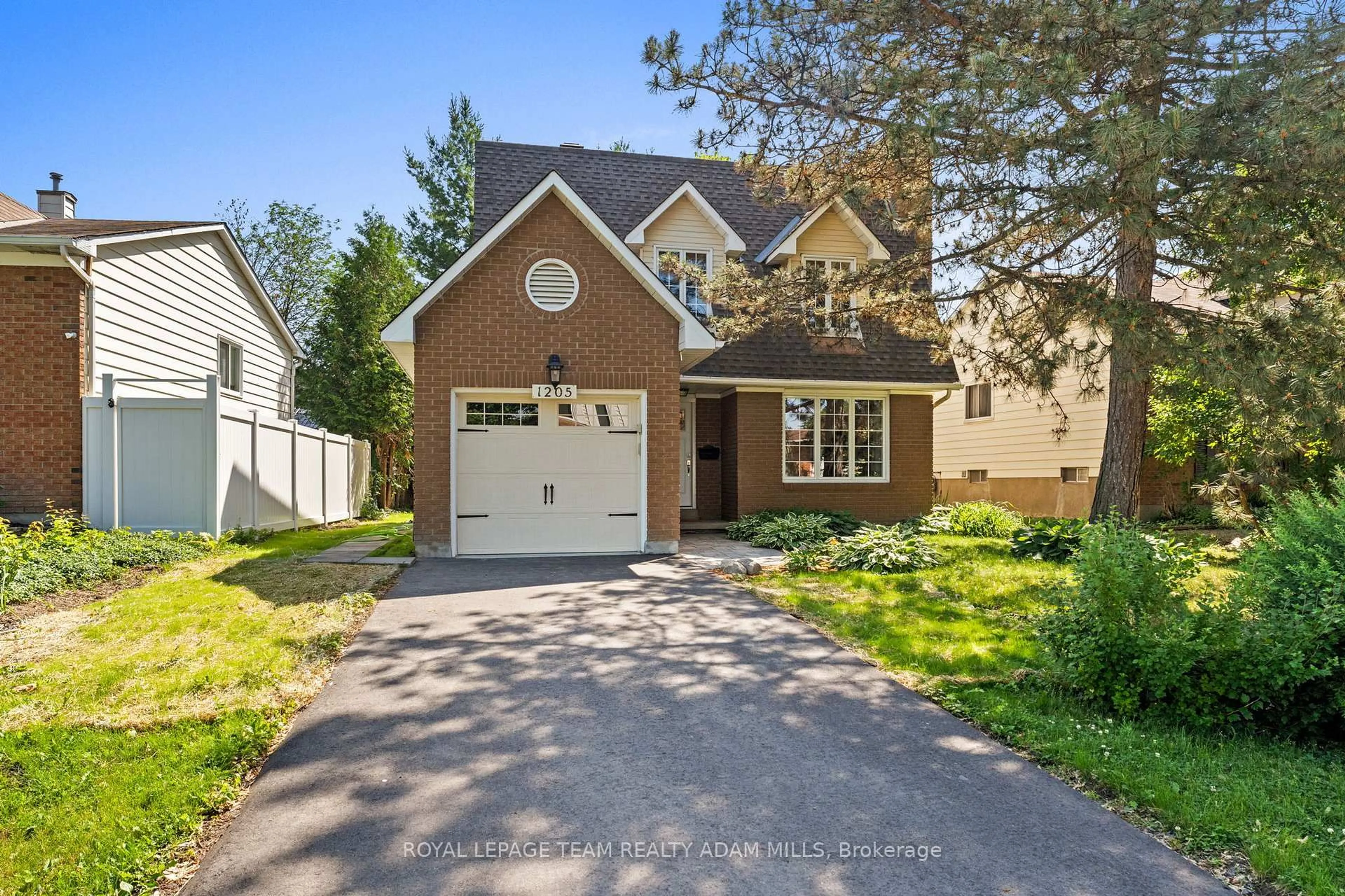 Home with brick exterior material, street for 1205 St. Moritz Crt, Ottawa Ontario K1C 2B2