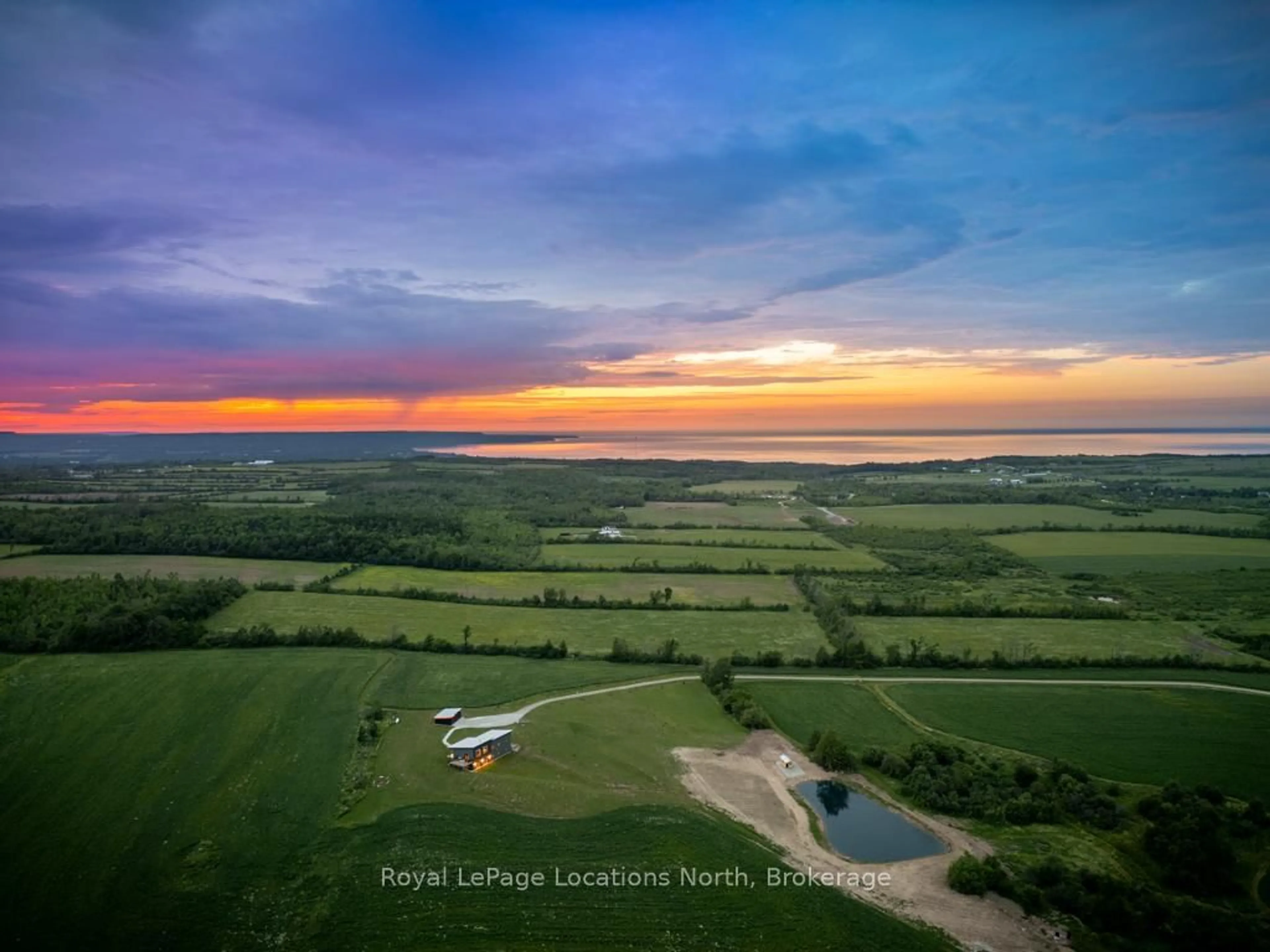 A pic from outside/outdoor area/front of a property/back of a property/a pic from drone, water/lake/river/ocean view for 317278 3 Line, Meaford Ontario N4L 1W7