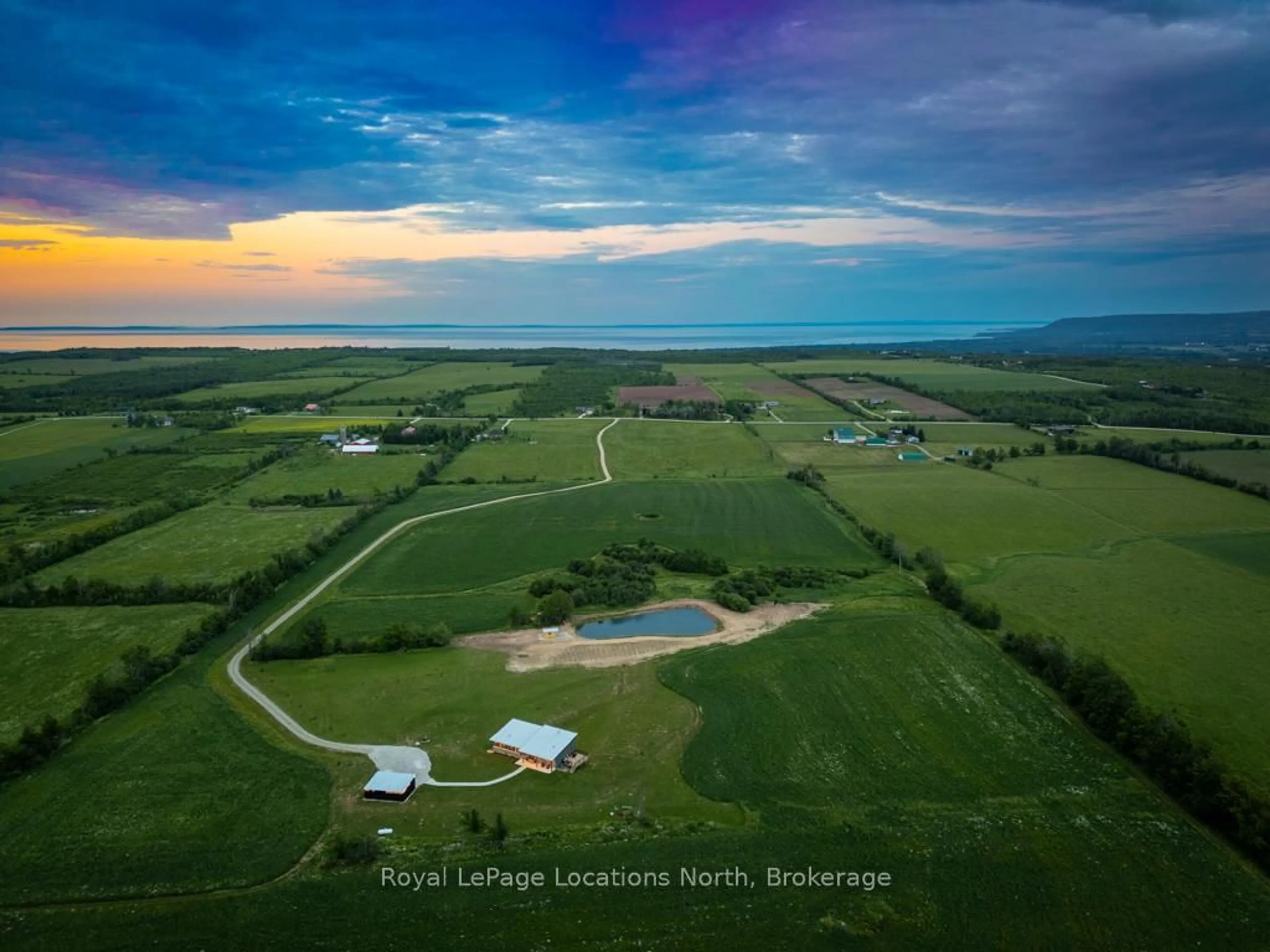 A pic from outside/outdoor area/front of a property/back of a property/a pic from drone, mountain view for 317278 3 Line, Meaford Ontario N4L 1W7