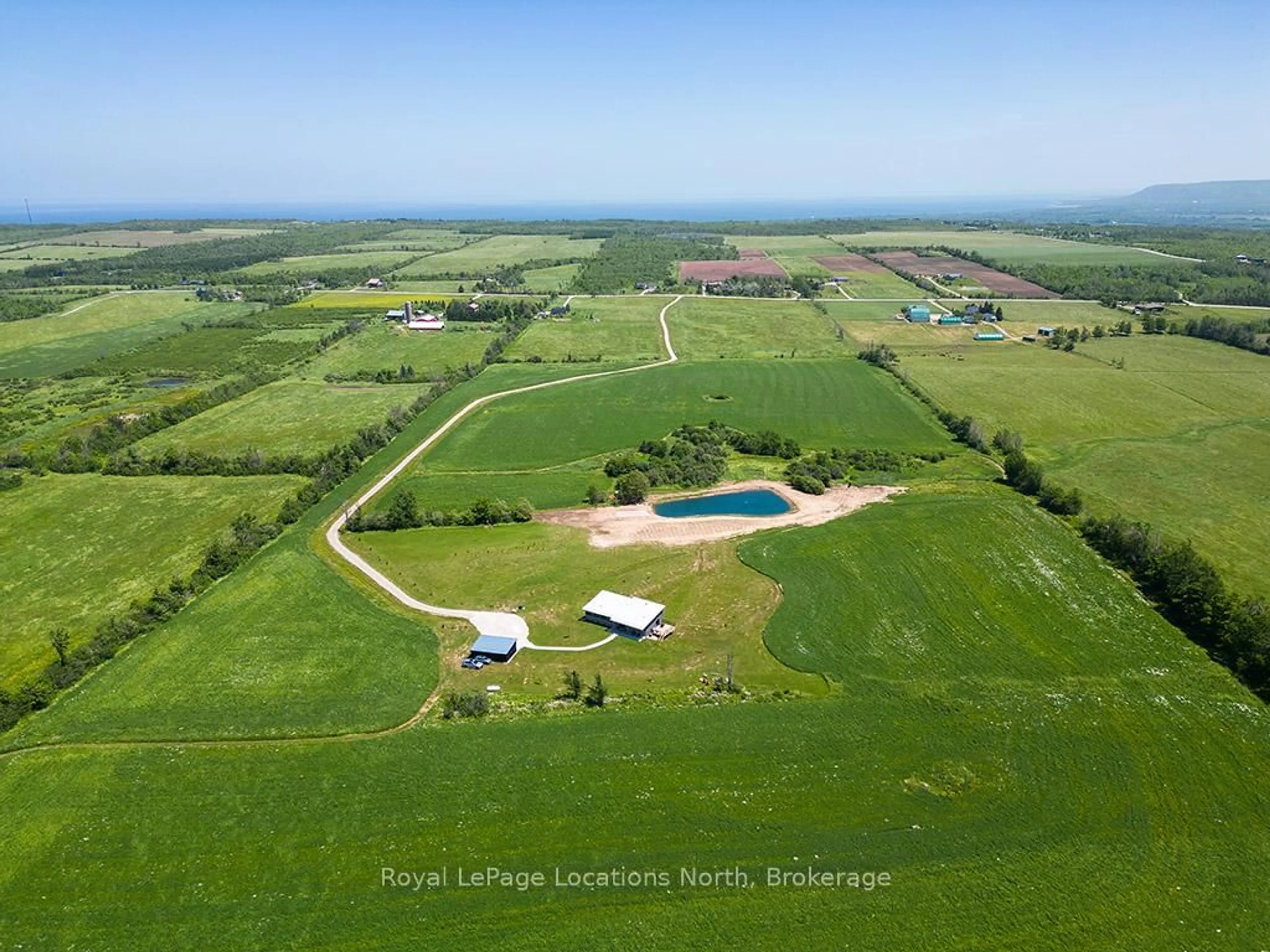A pic from outside/outdoor area/front of a property/back of a property/a pic from drone, water/lake/river/ocean view for 317278 3 Line, Meaford Ontario N4L 1W7