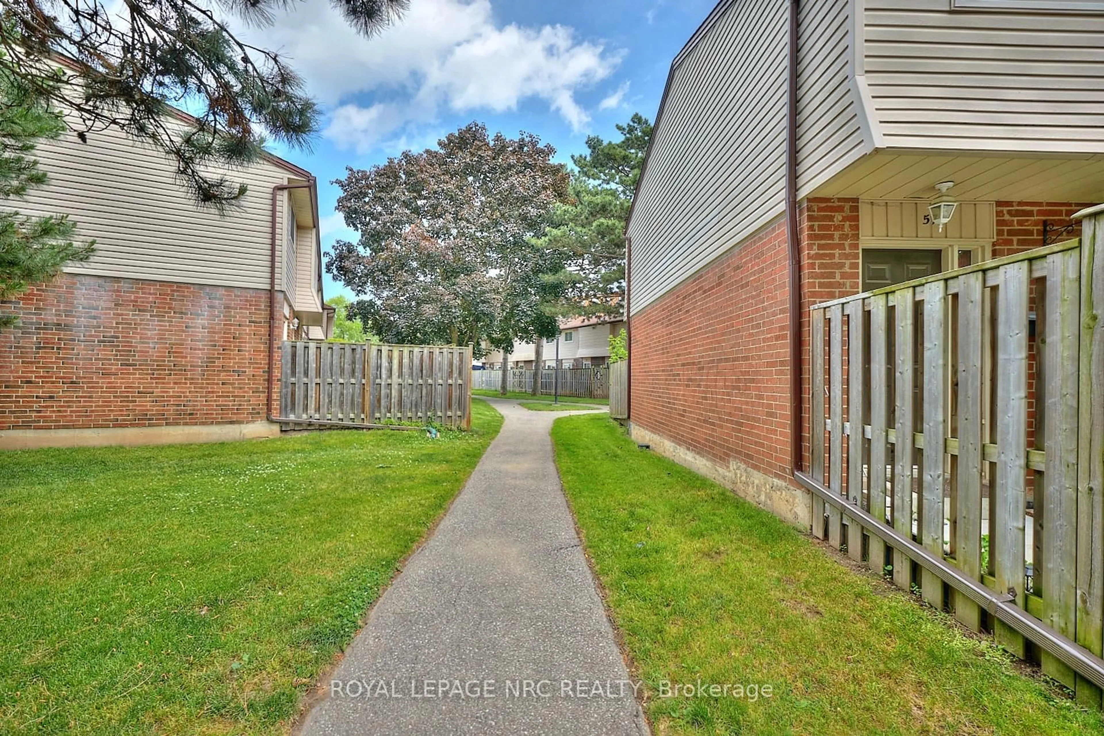 A pic from outside/outdoor area/front of a property/back of a property/a pic from drone, street for 2 WEIDEN St #22, St. Catharines Ontario L2M 6W5