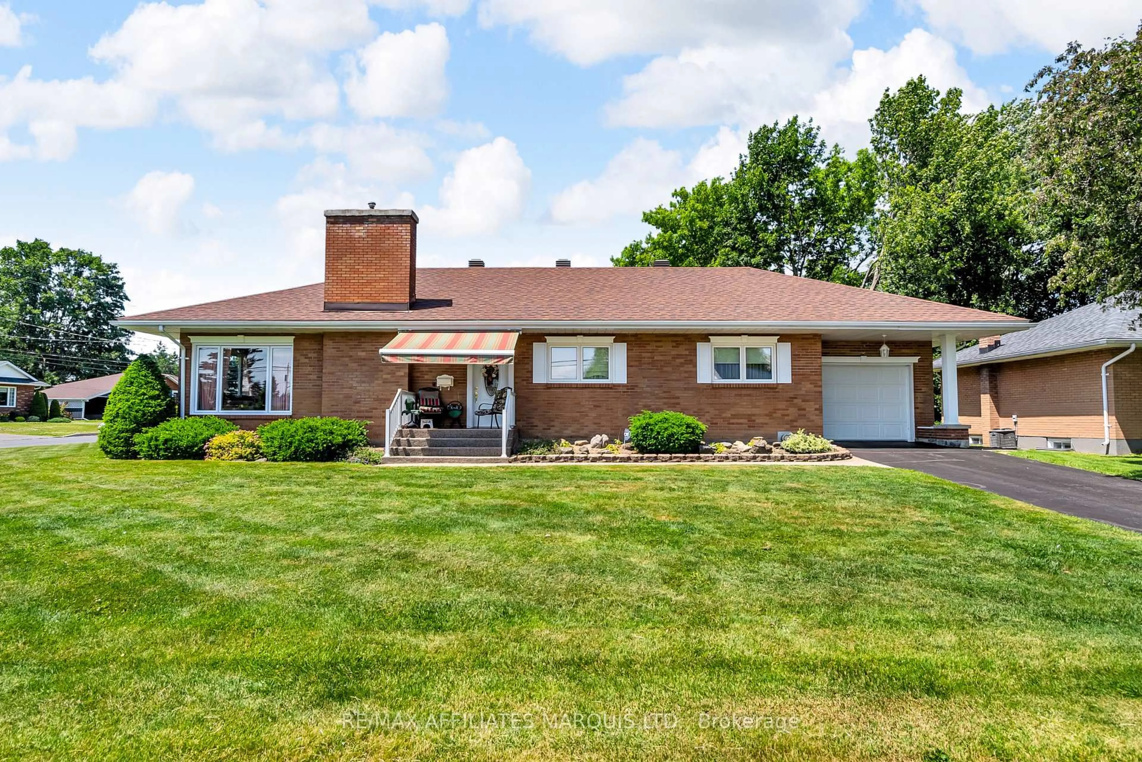 Home with brick exterior material, street for 1413 Queen St, Cornwall Ontario K6J 1R3