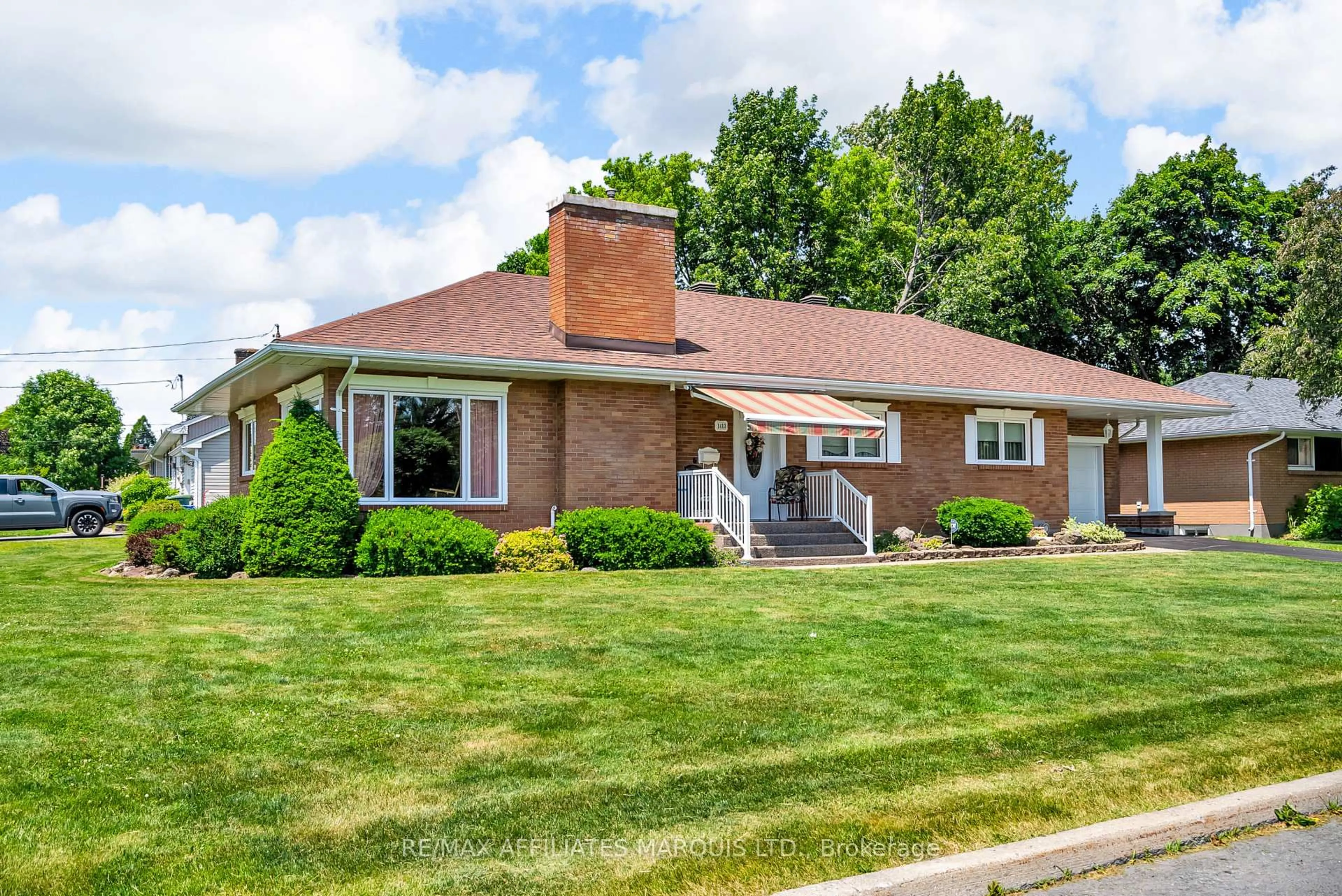 Home with brick exterior material, street for 1413 Queen St, Cornwall Ontario K6J 1R3