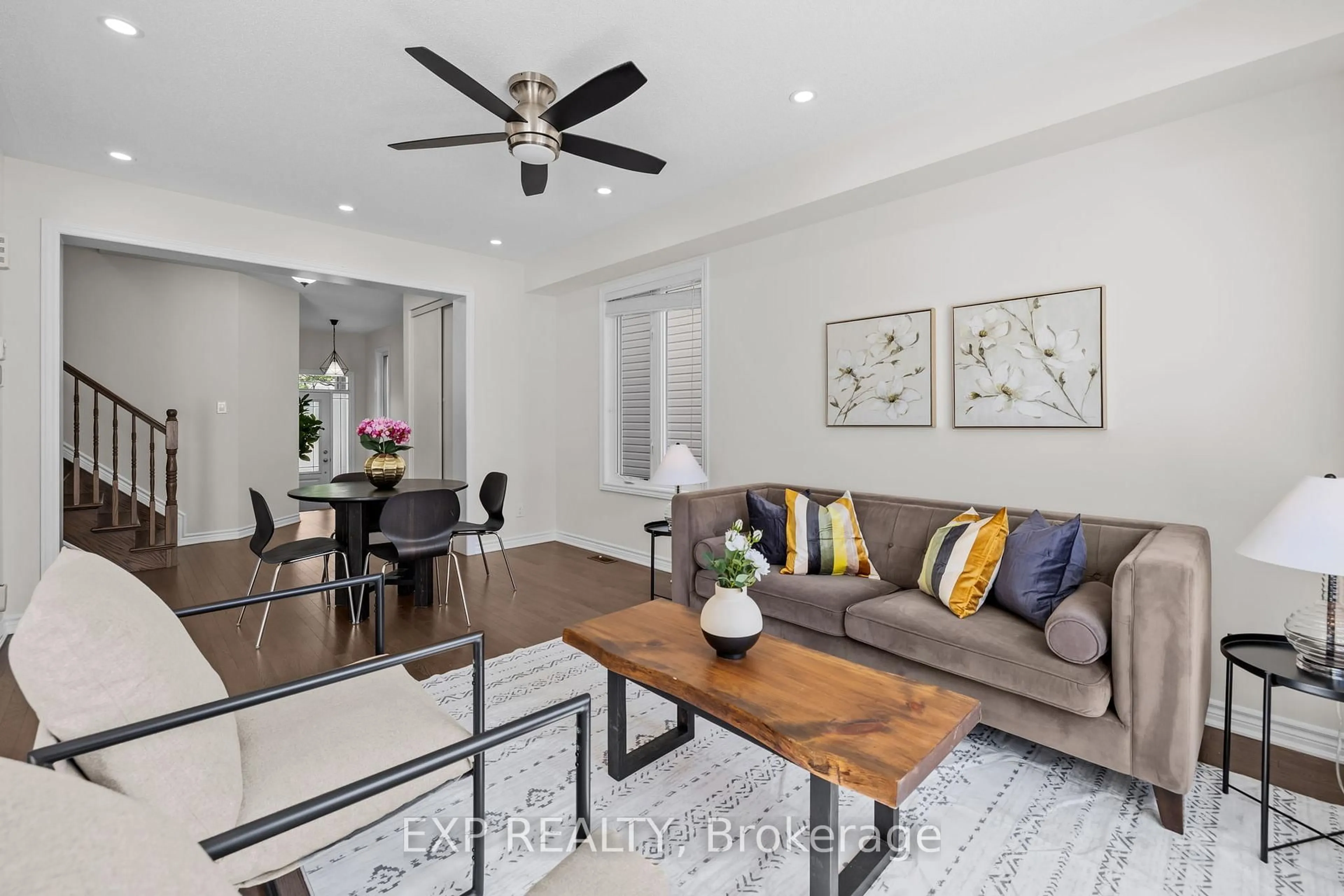 Living room with furniture, wood/laminate floor for 255 Rivertree St, Ottawa Ontario K2M 0J6