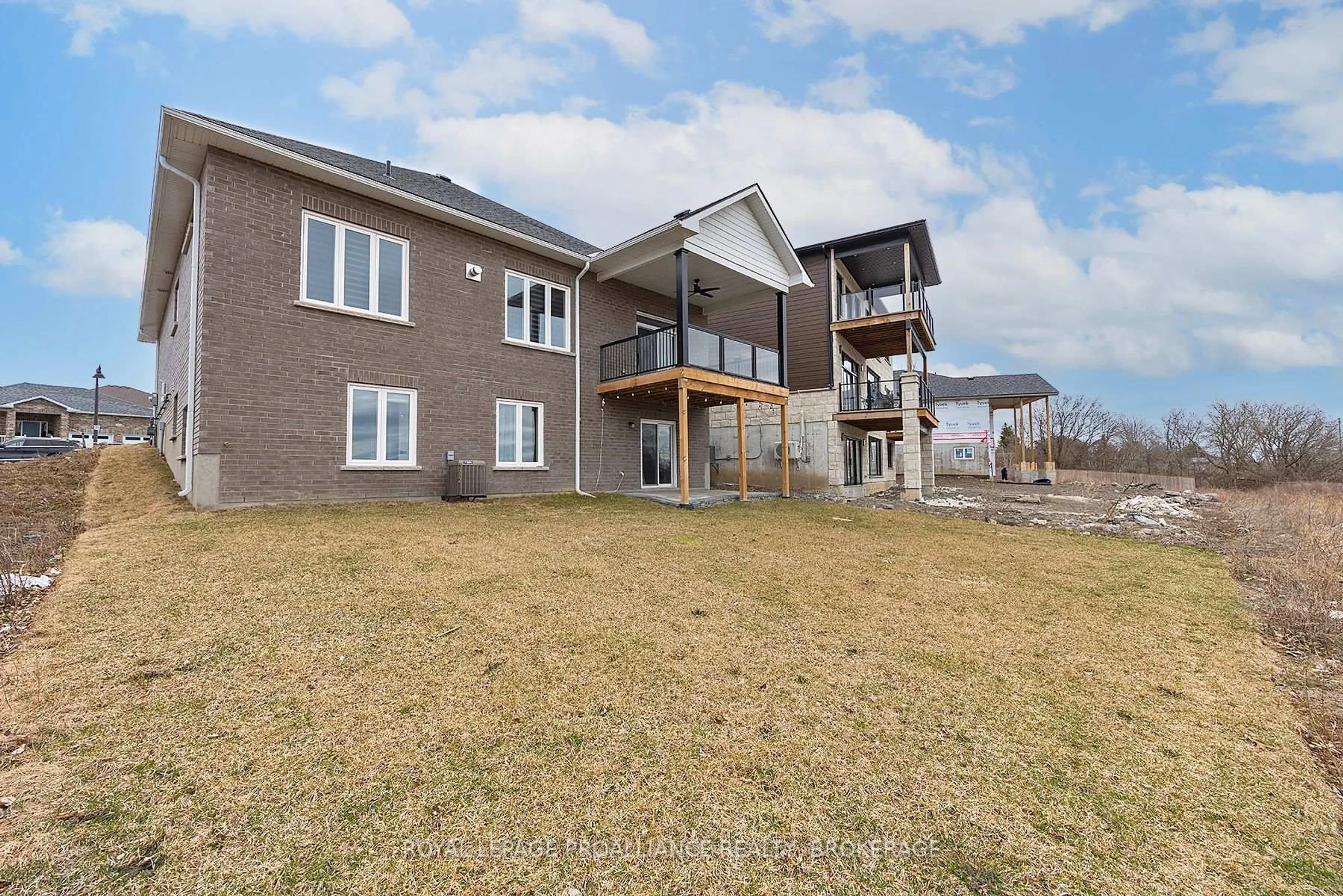A pic from outside/outdoor area/front of a property/back of a property/a pic from drone, unknown for 1245 Carfa Cres, Kingston Ontario K7P 0M7