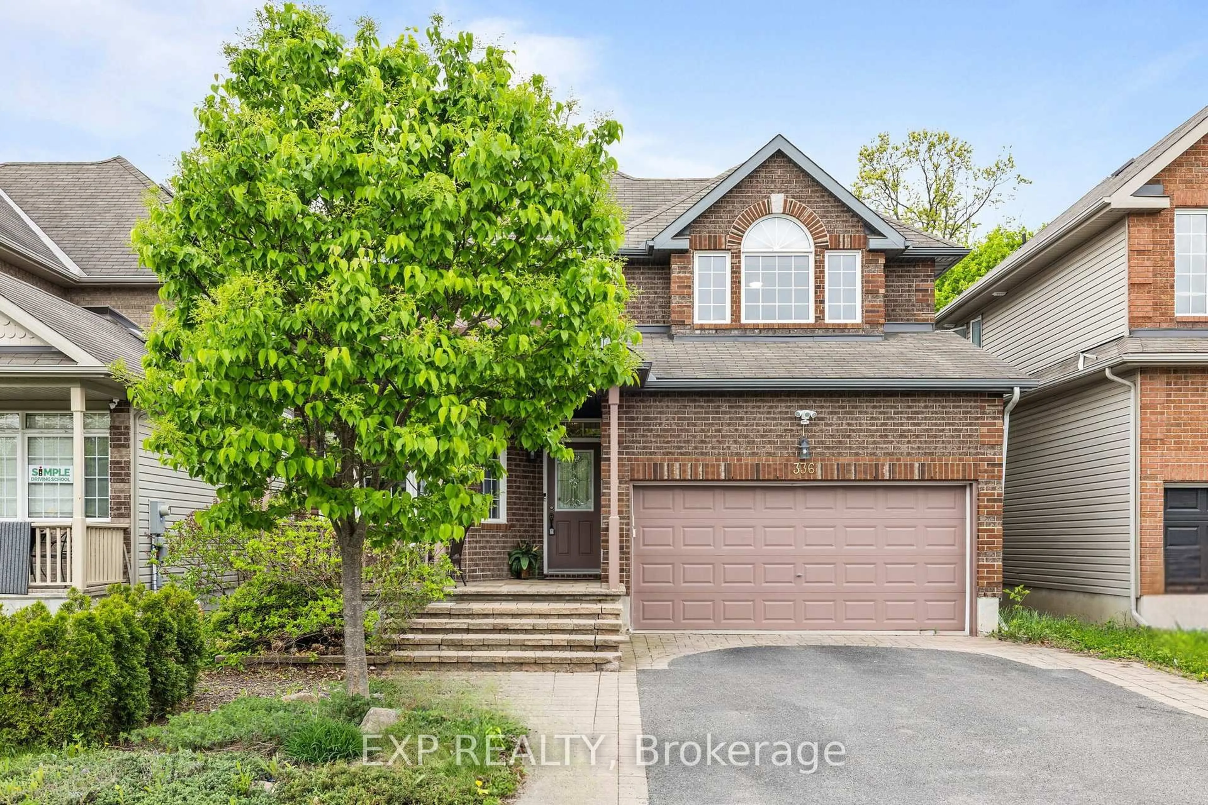 Home with brick exterior material, street for 336 Wisteria Cres, Ottawa Ontario K1V 0N5