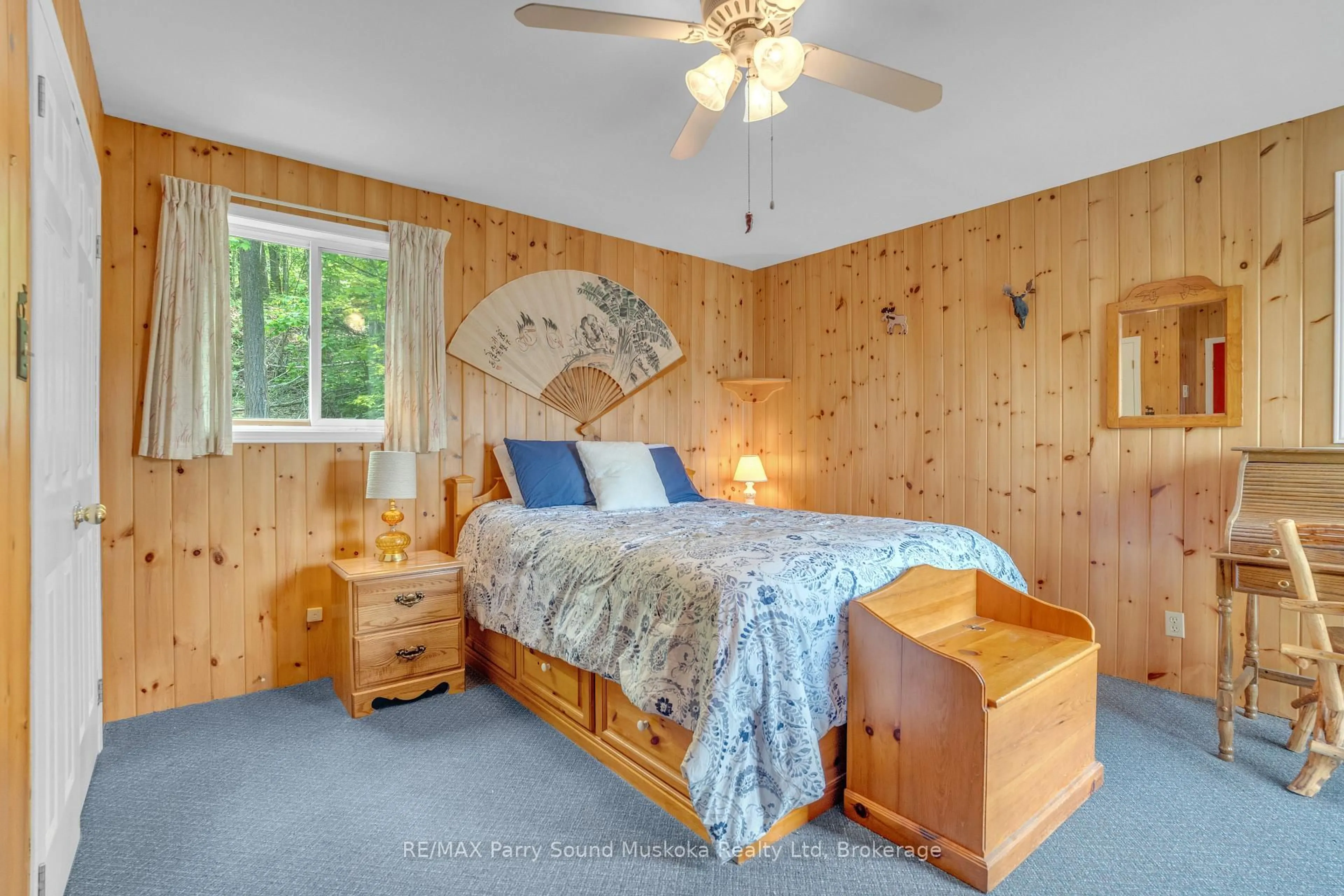 Bedroom with bed, wood/laminate floor for 124 Healey Lake Water, The Archipelago Ontario P2A 2W8