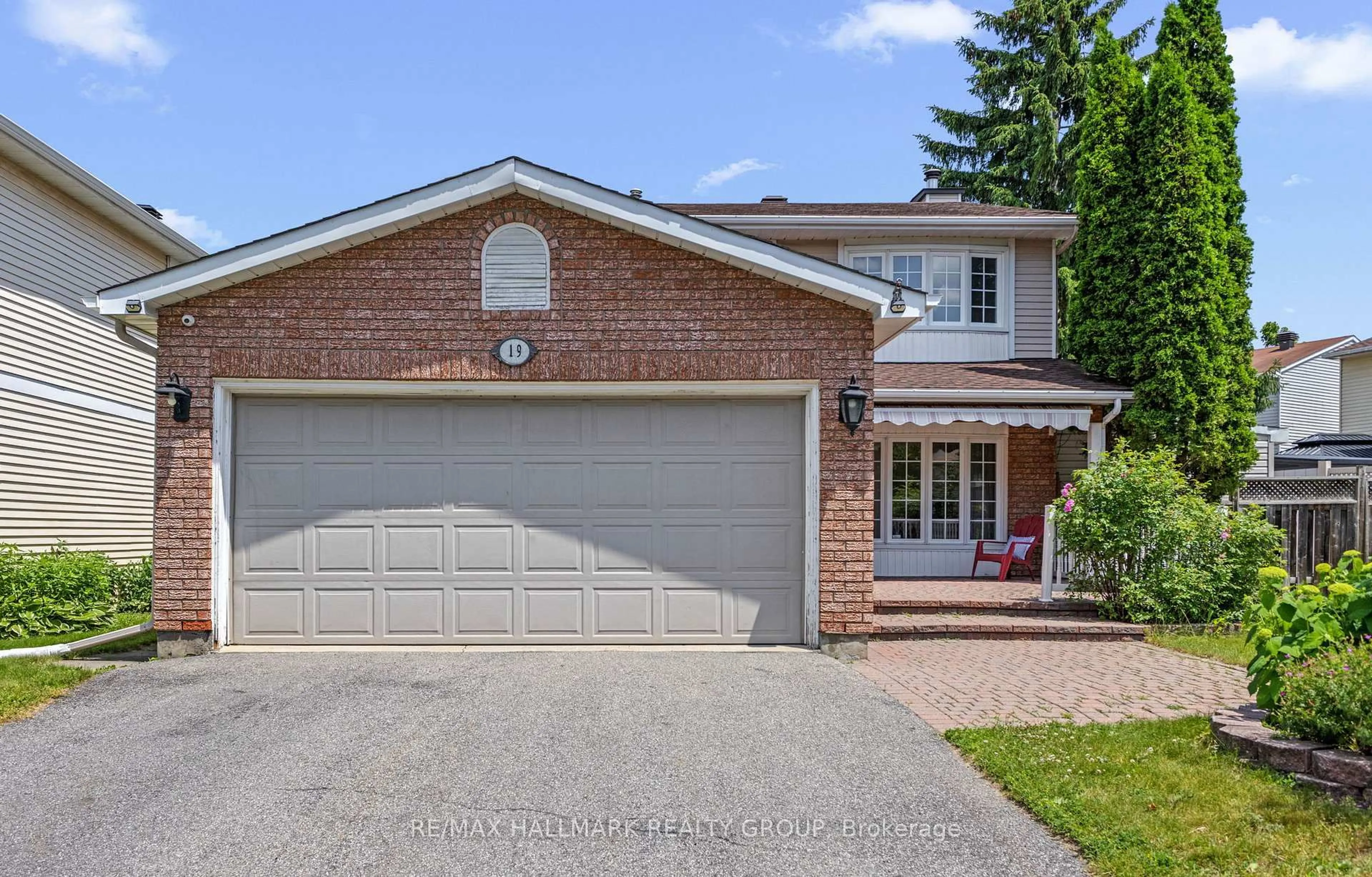 Home with brick exterior material, street for 19 Notman Way, Ottawa Ontario K1G 4P6