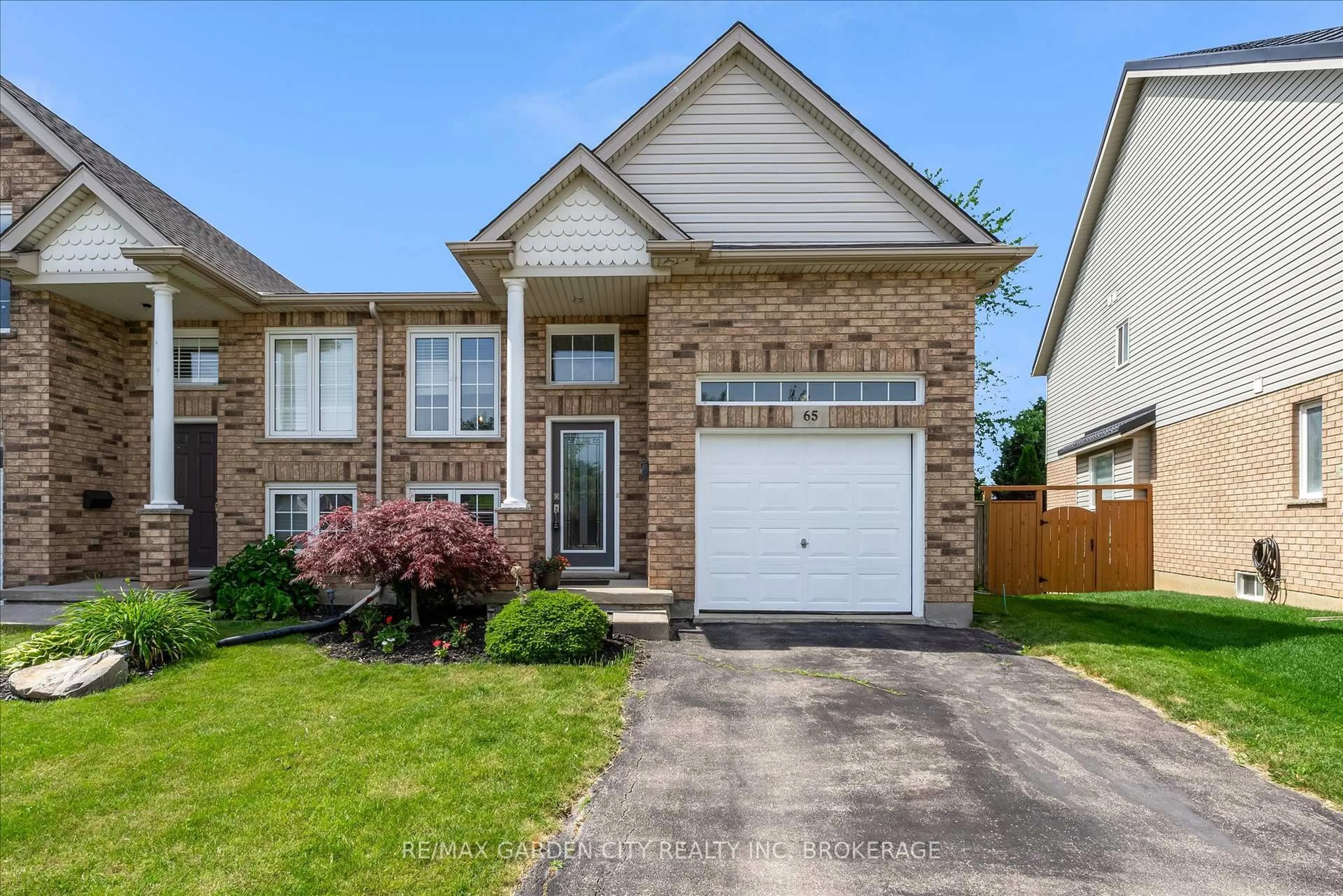 Home with brick exterior material, street for 65 MCBRIDE Dr, St. Catharines Ontario L2S 3Z8