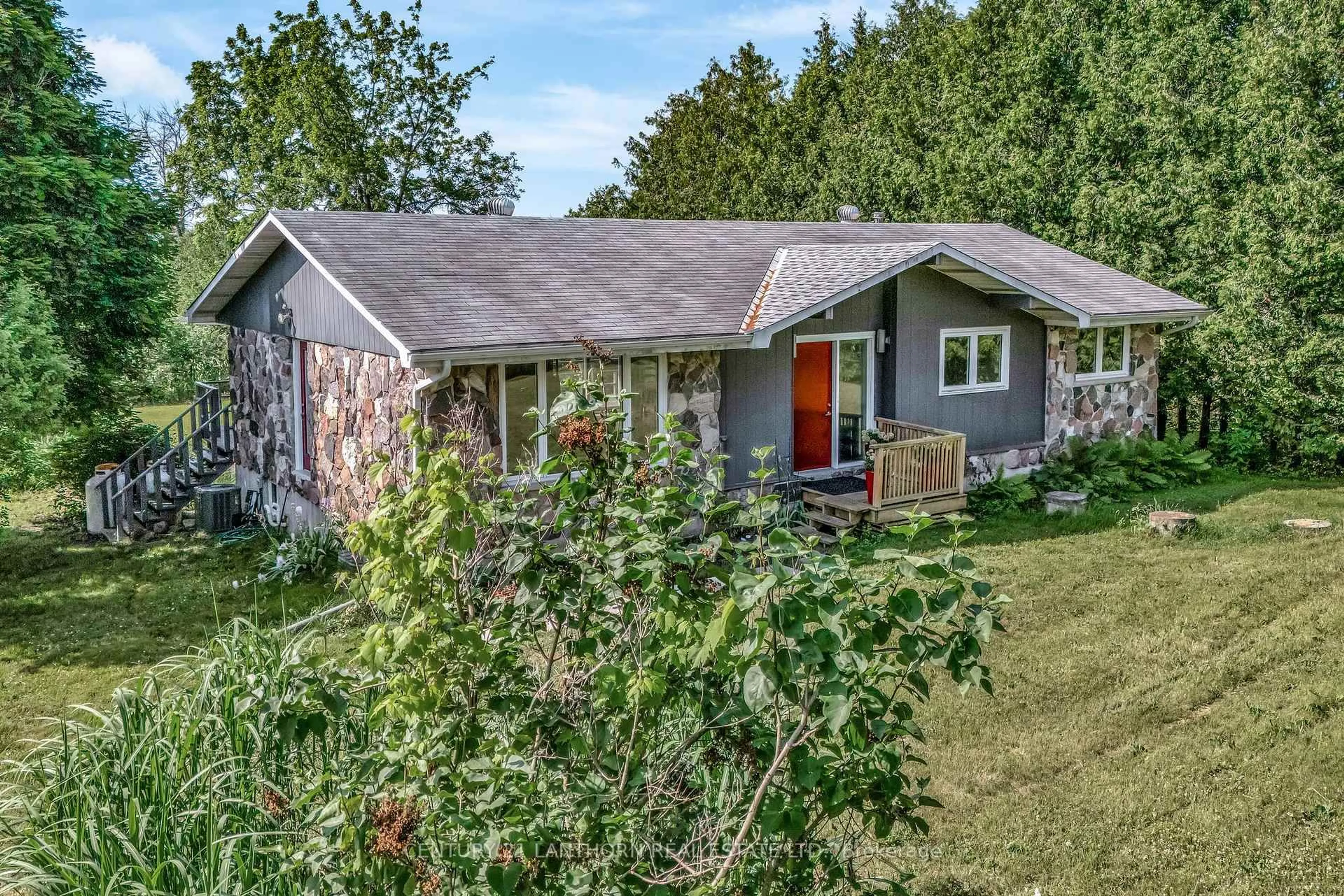 A pic from outside/outdoor area/front of a property/back of a property/a pic from drone, street for 1593 Lakeside Dr, Prince Edward County Ontario K0K 1L0