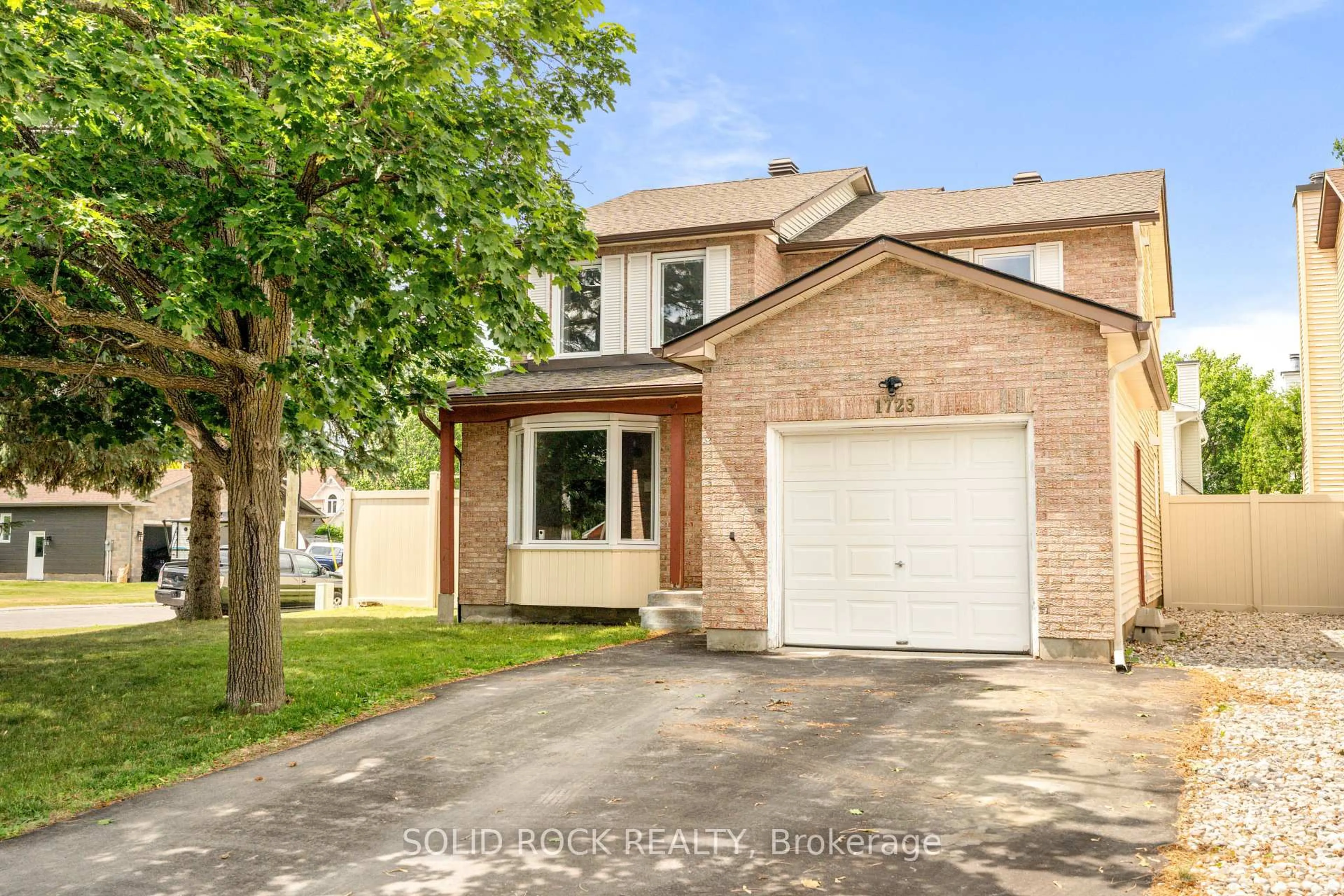 Home with brick exterior material, street for 1723 Boyer Rd, Ottawa Ontario K1C 3H8