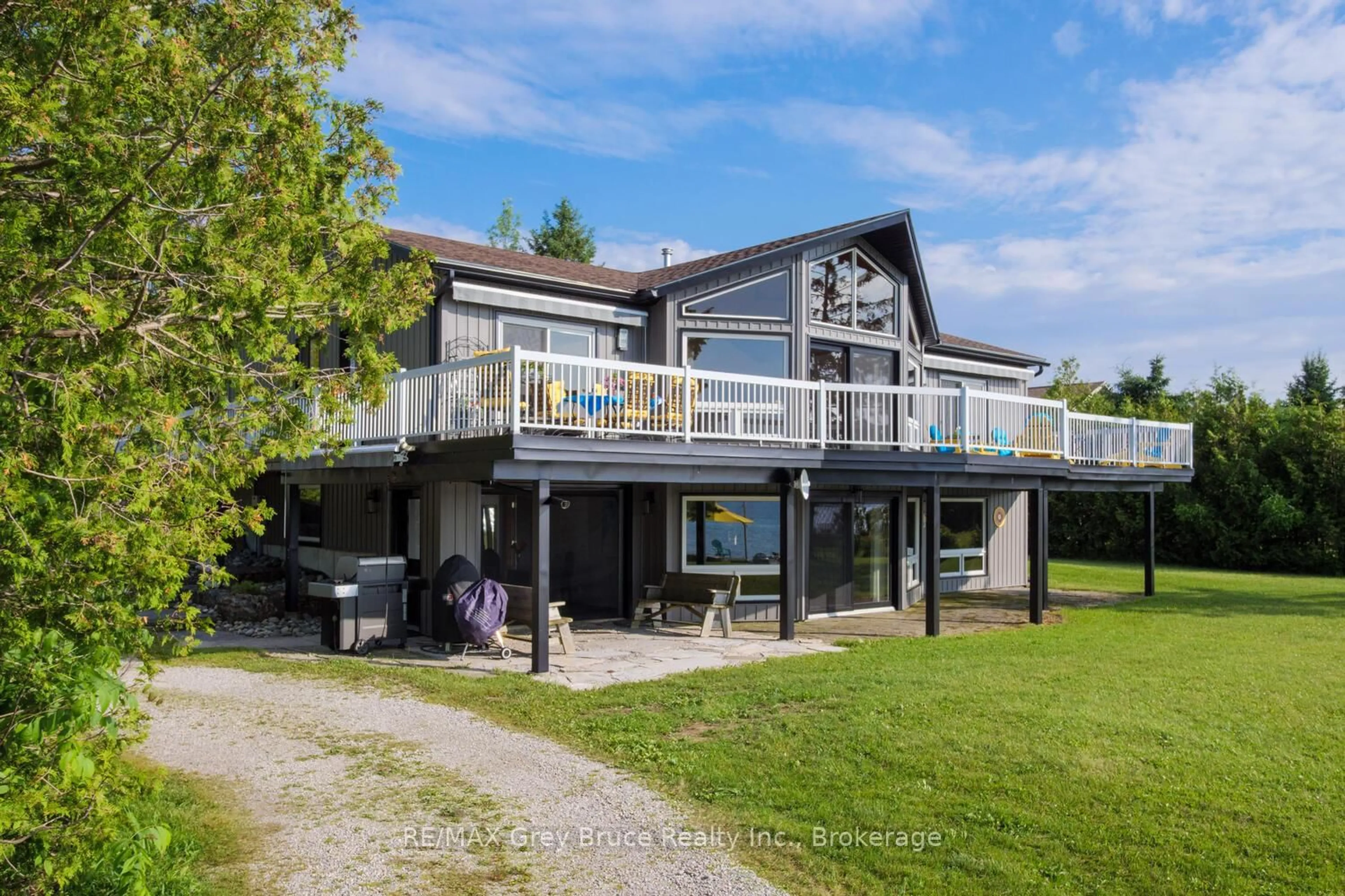 A pic from outside/outdoor area/front of a property/back of a property/a pic from drone, unknown for 501219 Grey Road 1 Rd, Georgian Bluffs Ontario N0H 2T0