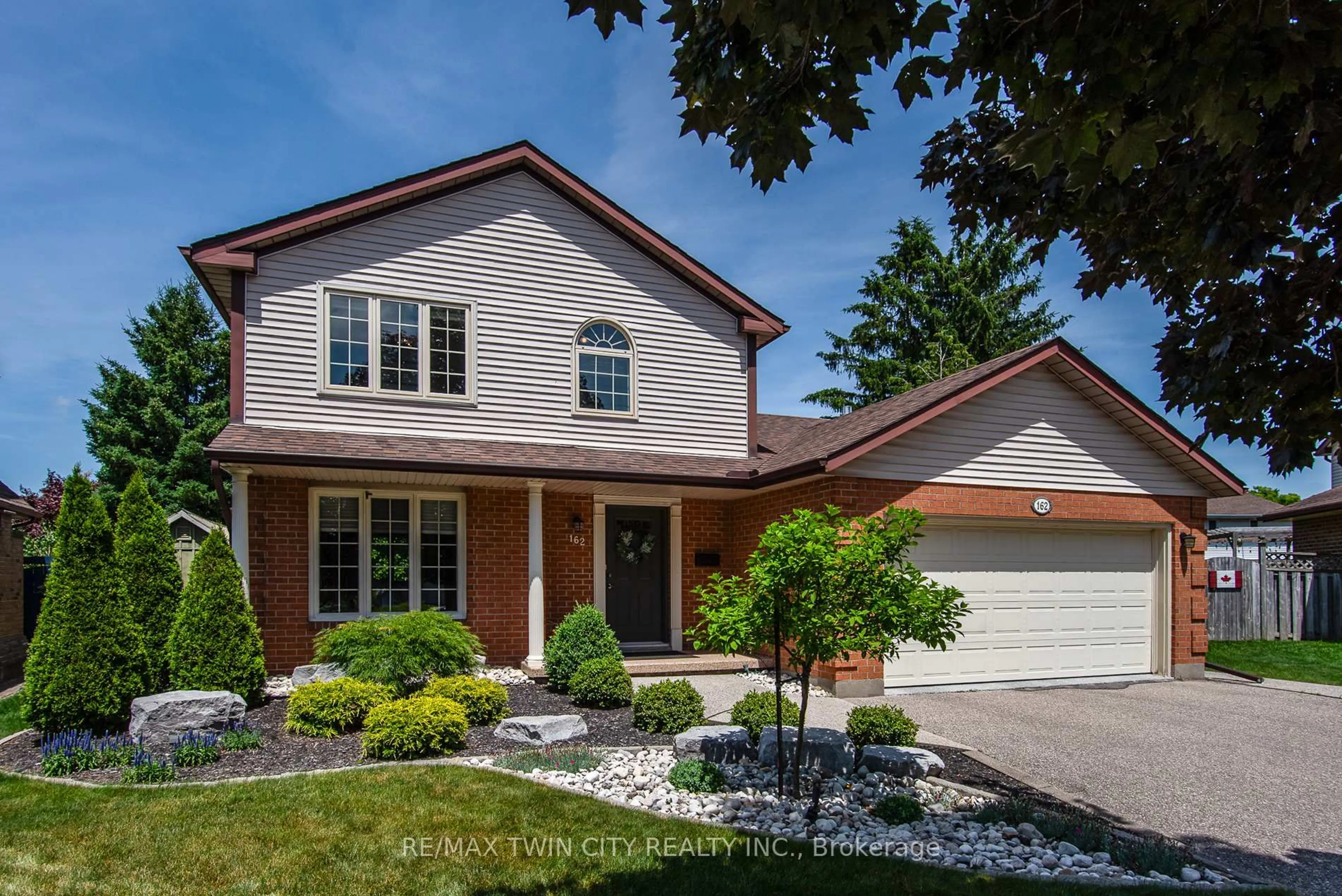 Home with brick exterior material, street for 162 Ambleside Crt, Waterloo Ontario N2K 3E4