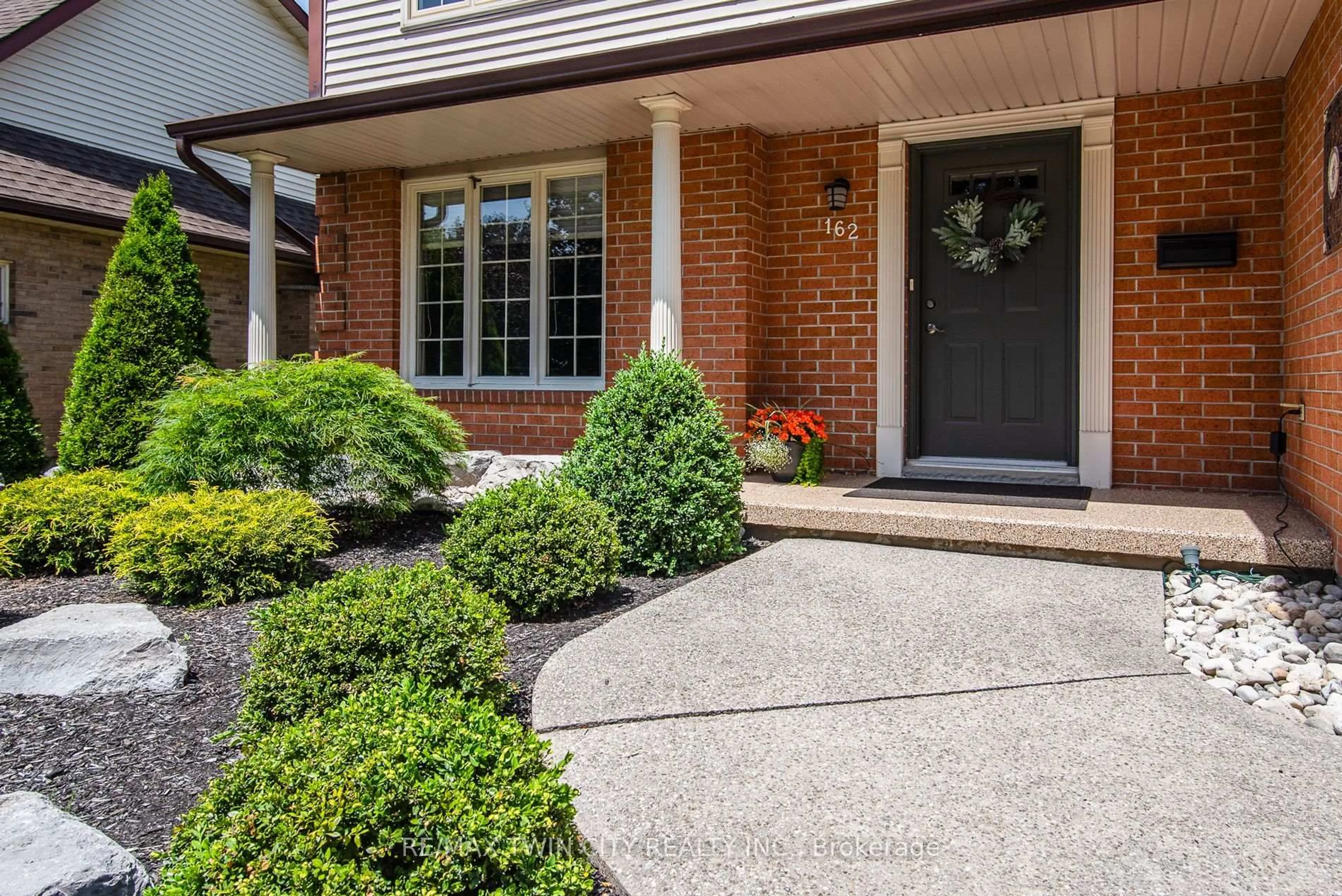 Home with brick exterior material, street for 162 Ambleside Crt, Waterloo Ontario N2K 3E4