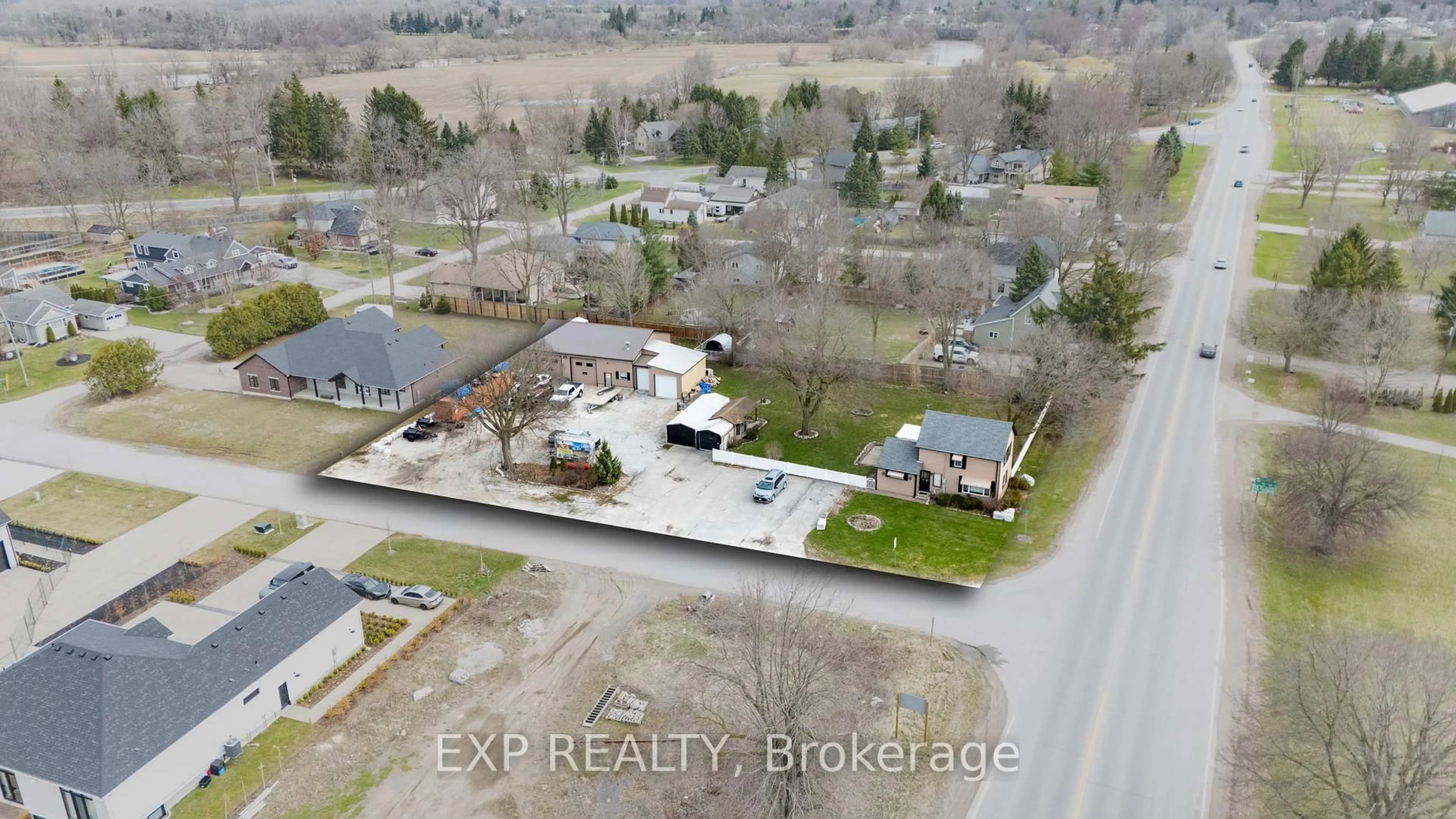 A pic from outside/outdoor area/front of a property/back of a property/a pic from drone, street for 21332 Wilson St, Middlesex Centre Ontario N0L 1E0