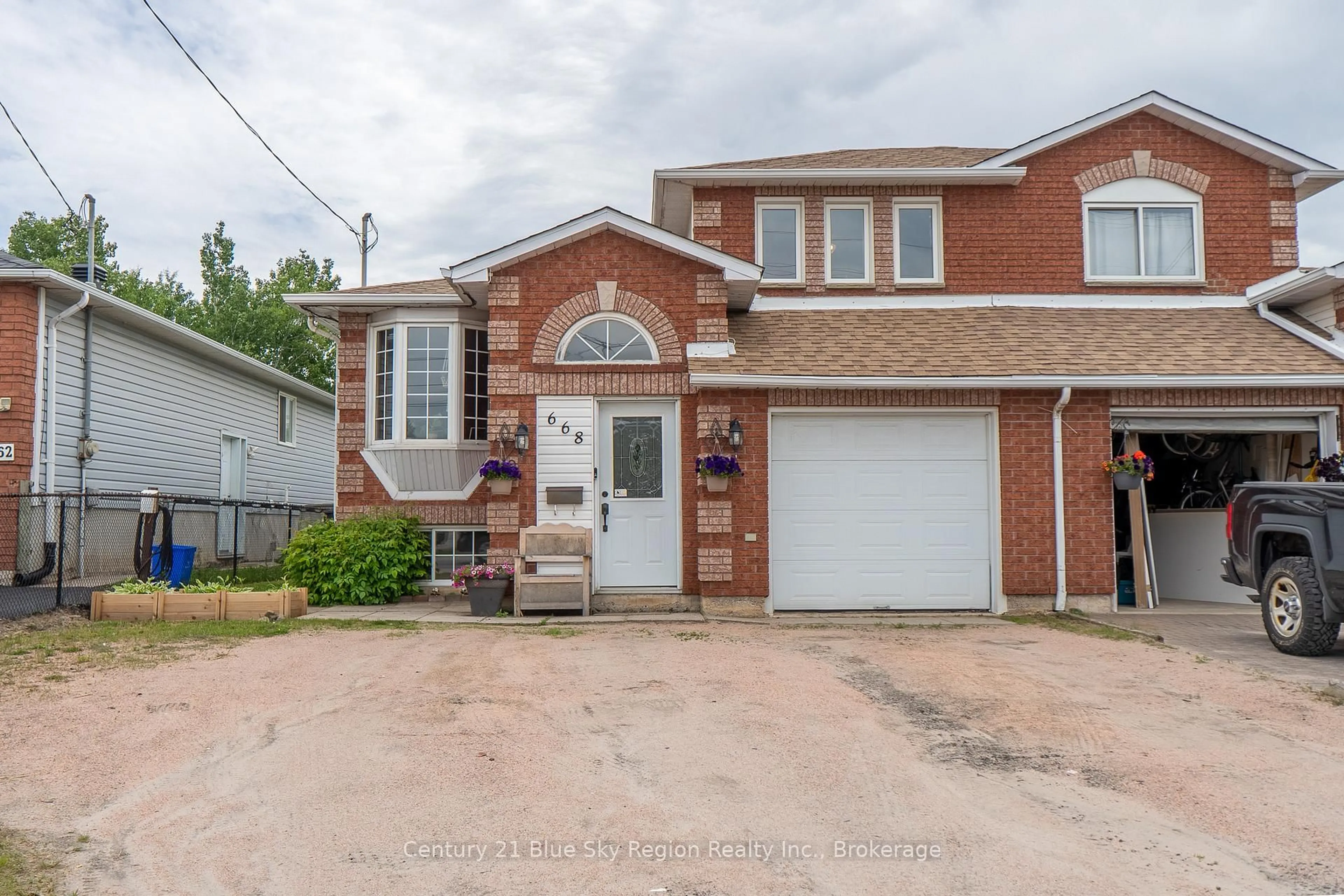 Home with brick exterior material, street for 668 Wallace Rd, North Bay Ontario P1A 4M2
