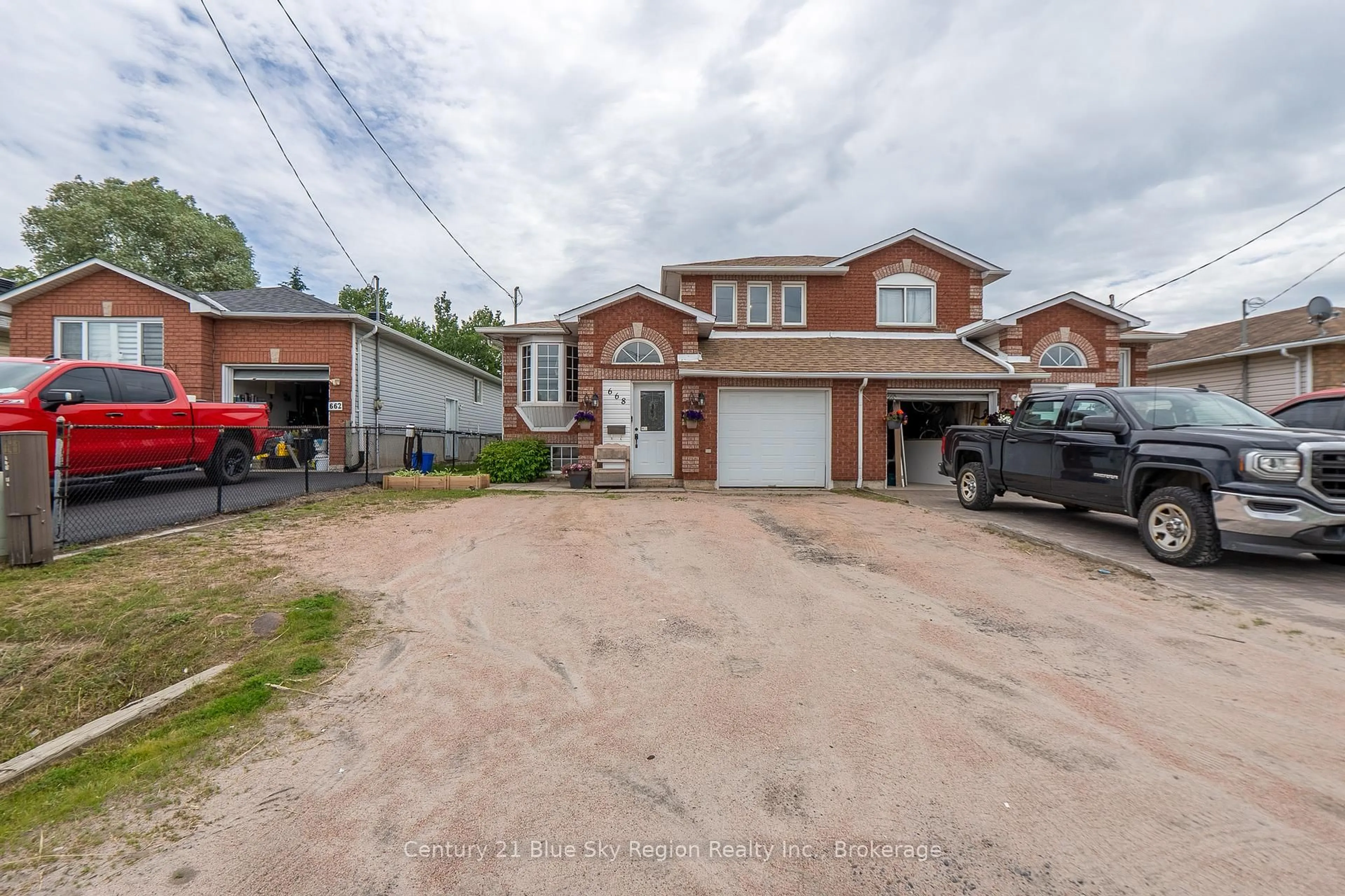 A pic from outside/outdoor area/front of a property/back of a property/a pic from drone, street for 668 Wallace Rd, North Bay Ontario P1A 4M2