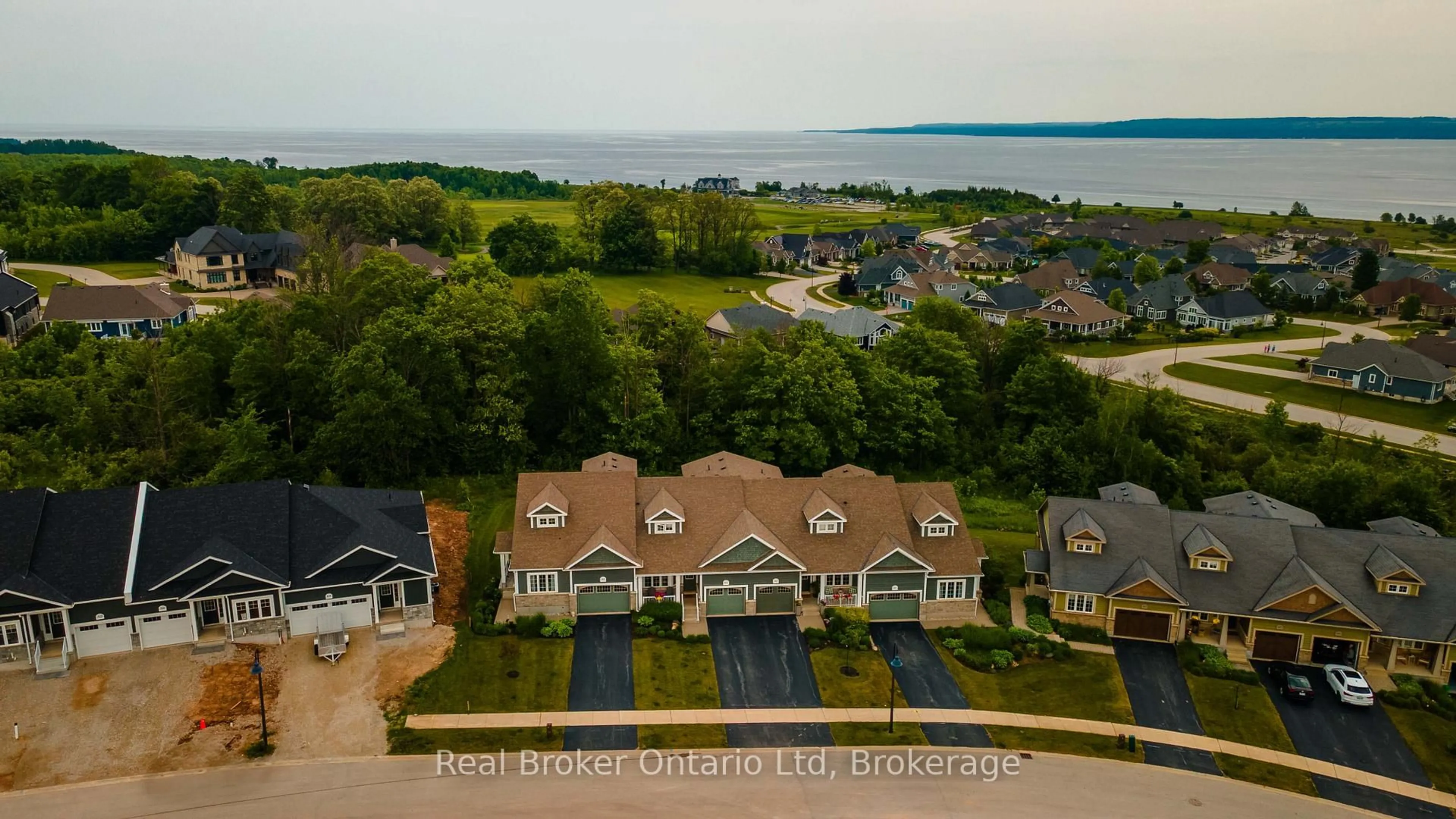 A pic from outside/outdoor area/front of a property/back of a property/a pic from drone, water/lake/river/ocean view for 315 Telford Tr, Georgian Bluffs Ontario N0H 1S0