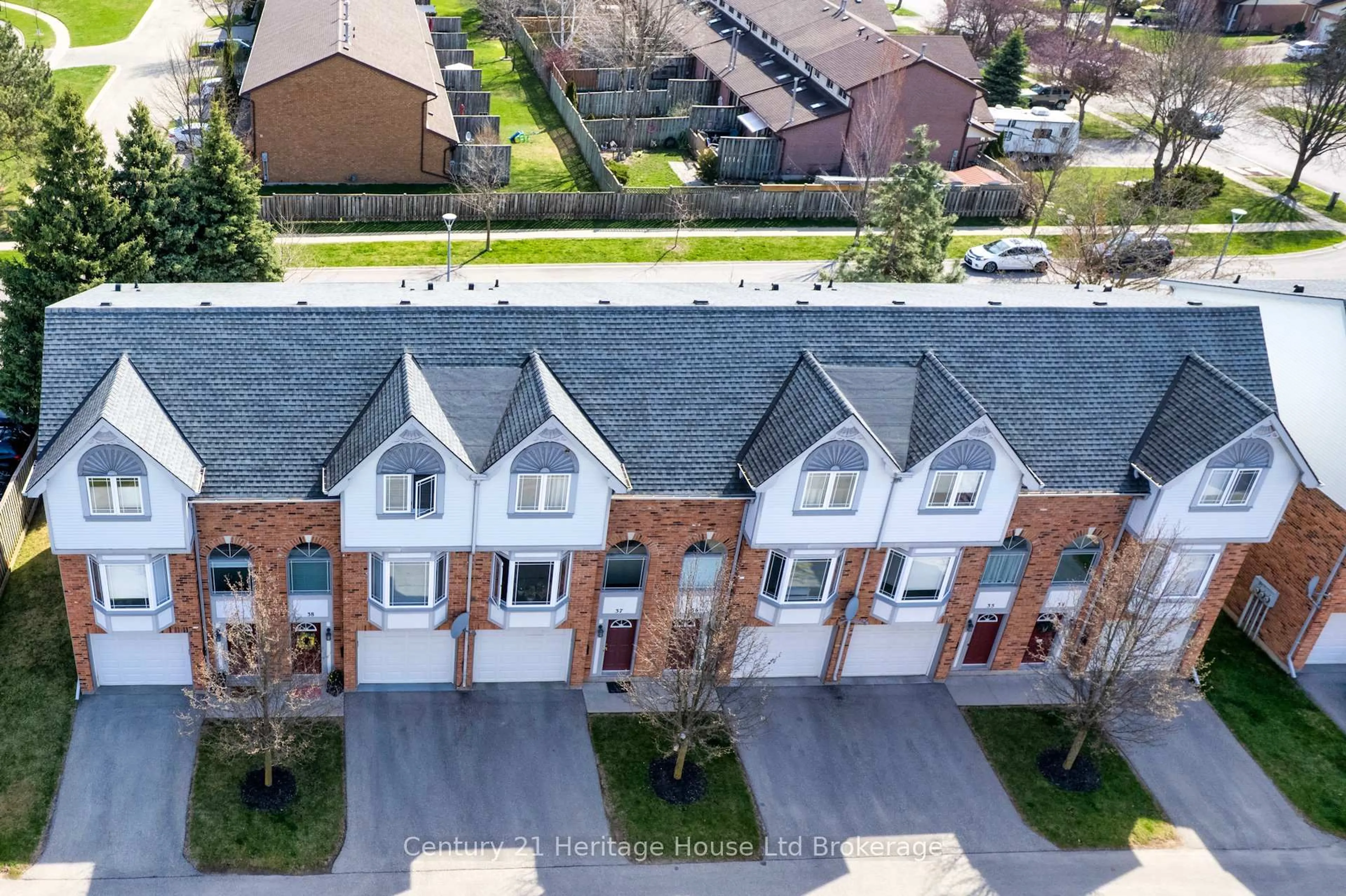 A pic from outside/outdoor area/front of a property/back of a property/a pic from drone, street for 46 Conestoga Rd #38, Woodstock Ontario N4T 1S4