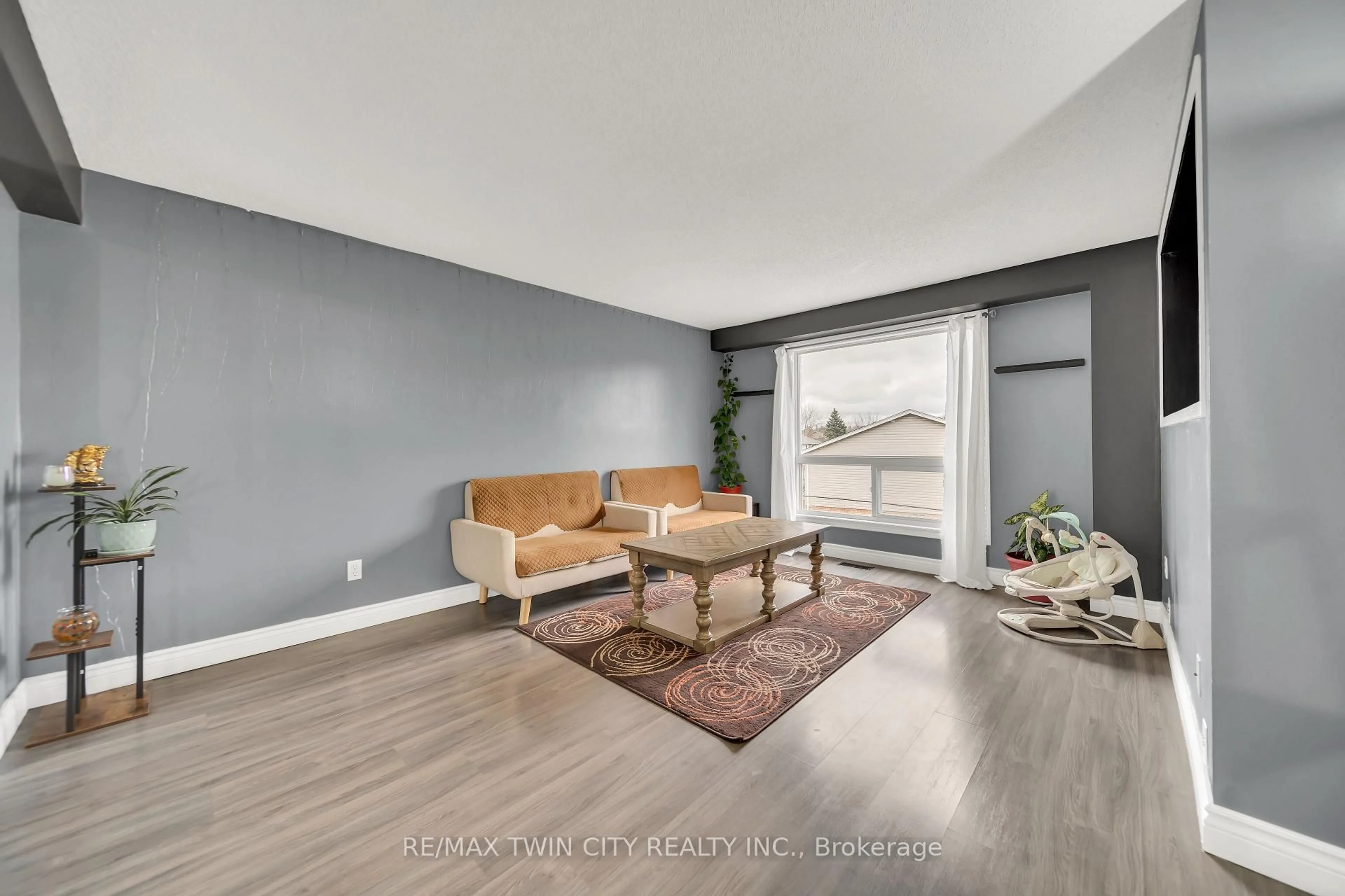 Living room with furniture, unknown for 648 Doon Village Rd #10, Kitchener Ontario N2P 1A2