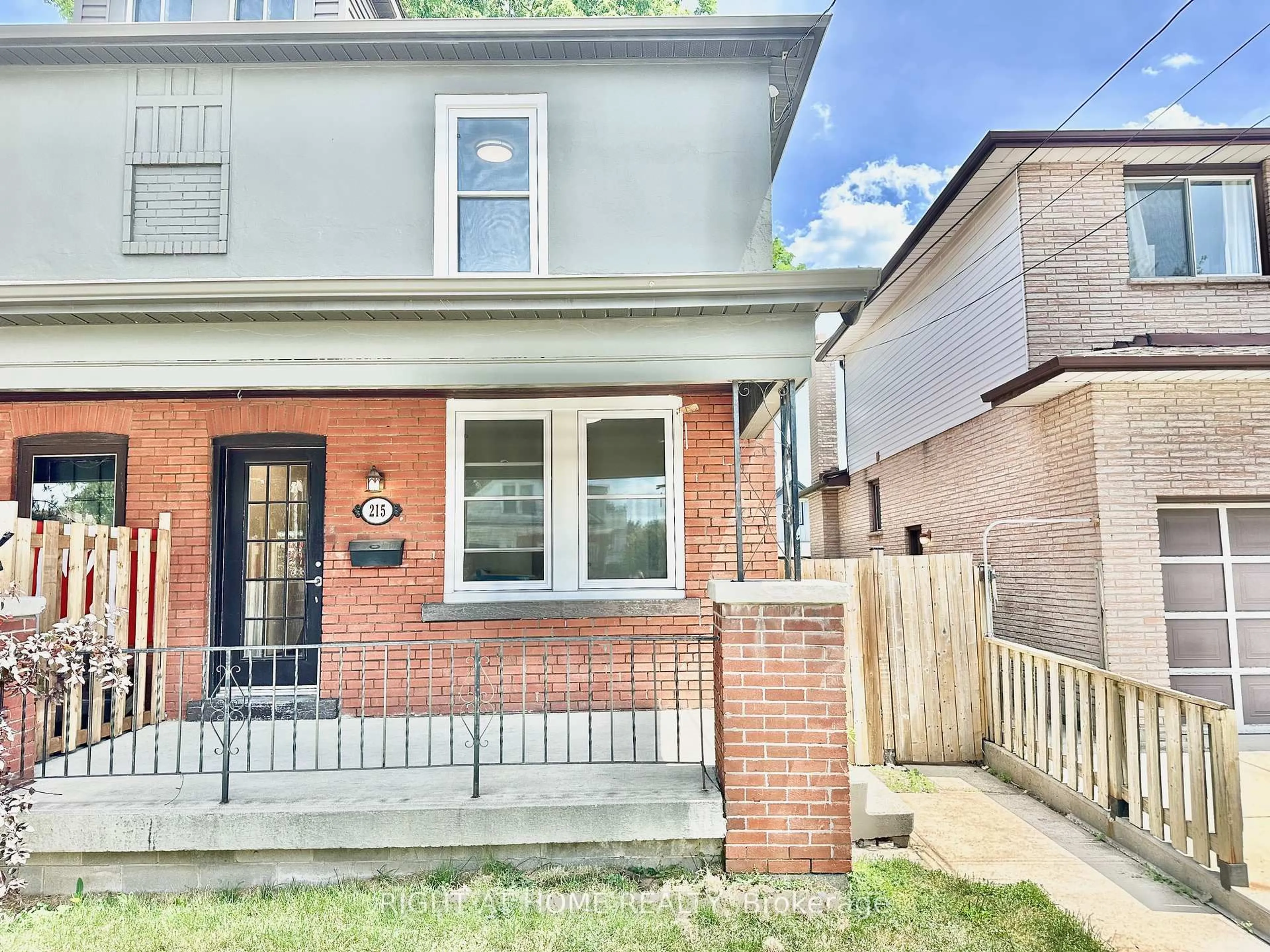 Home with brick exterior material, street for 215 Rosewood Rd, Hamilton Ontario L8K 3J5