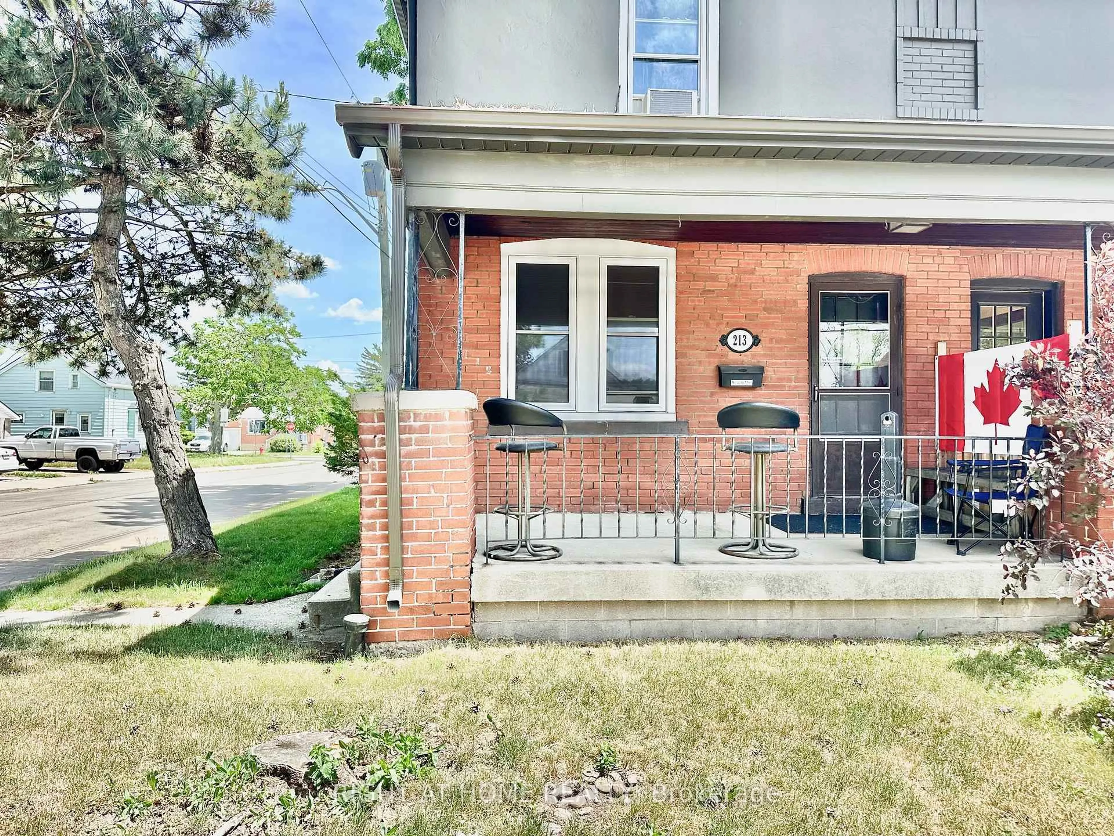Home with brick exterior material, street for 215 Rosewood Rd, Hamilton Ontario L8K 3J5
