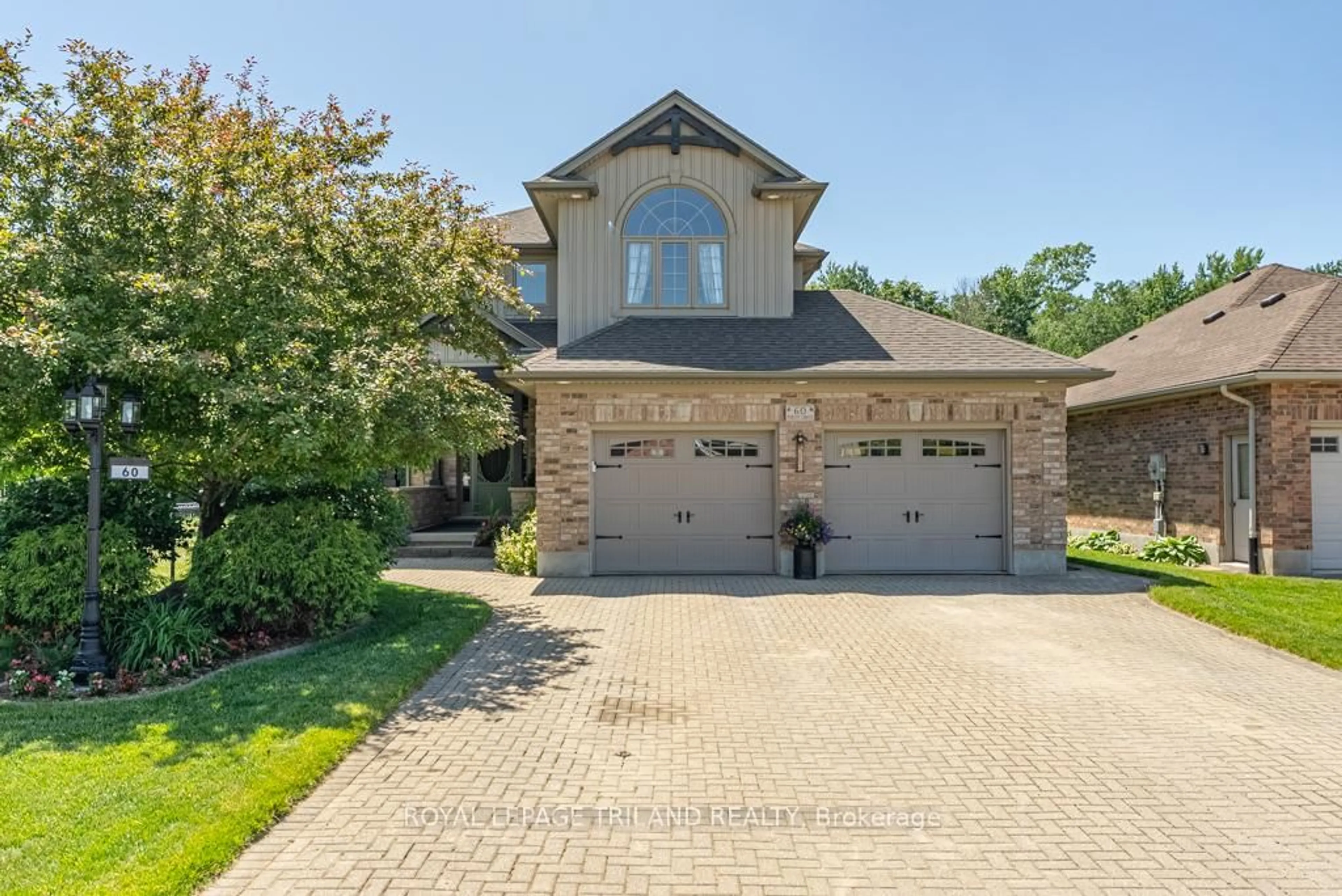 Home with brick exterior material, street for 60 Forest Grove Cres, Thames Centre Ontario N0L 1G3