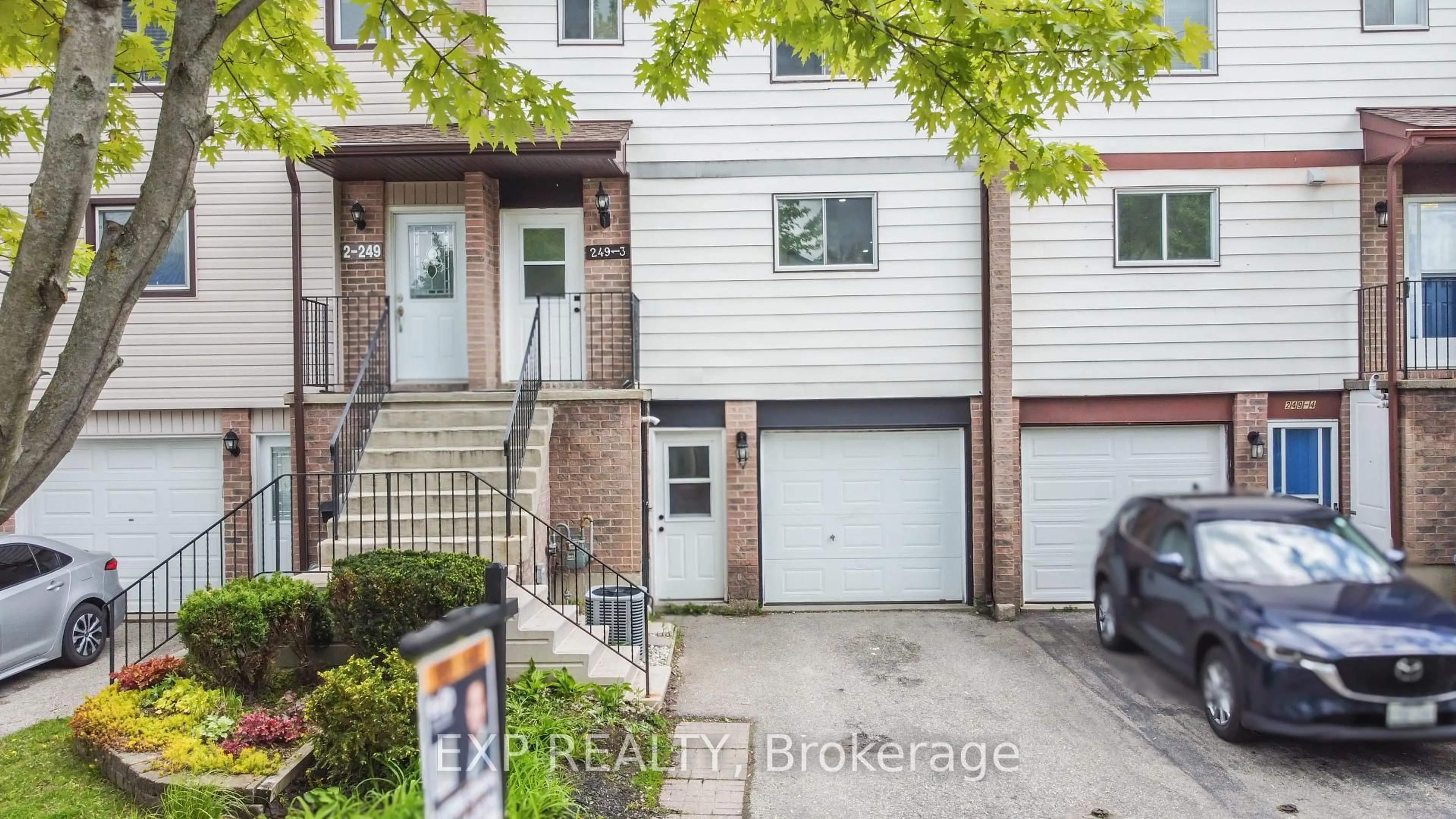 Home with brick exterior material, street for 249 Camelot Crt #3, Waterloo Ontario N2K 3G5