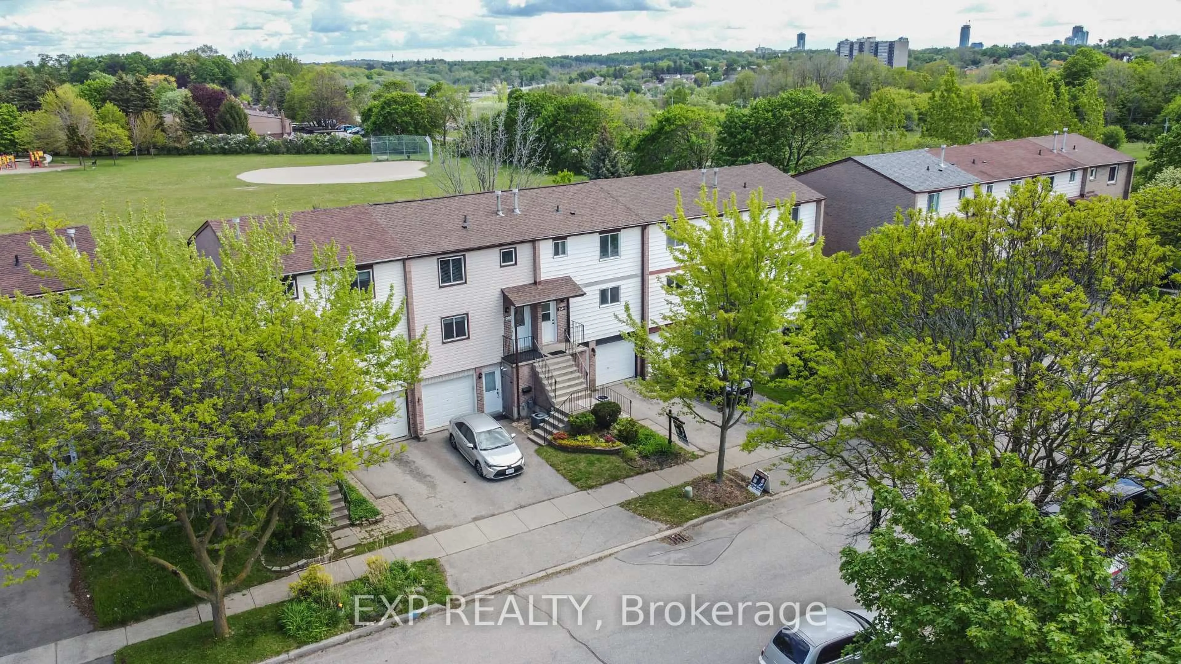 A pic from outside/outdoor area/front of a property/back of a property/a pic from drone, unknown for 249 Camelot Crt #3, Waterloo Ontario N2K 3G5