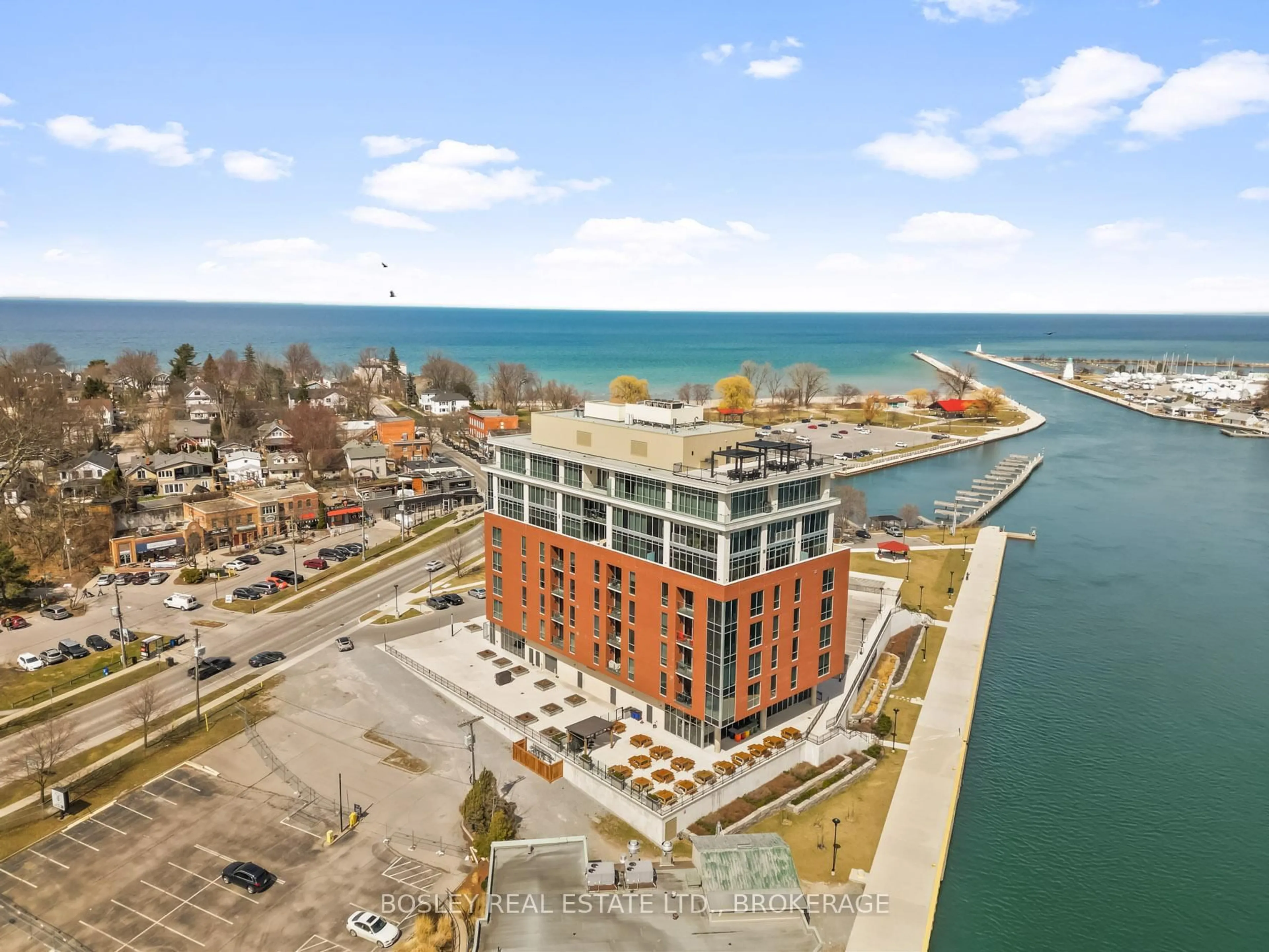 A pic from outside/outdoor area/front of a property/back of a property/a pic from drone, water/lake/river/ocean view for 57 Lakeport Rd #407, St. Catharines Ontario L2N 4P6