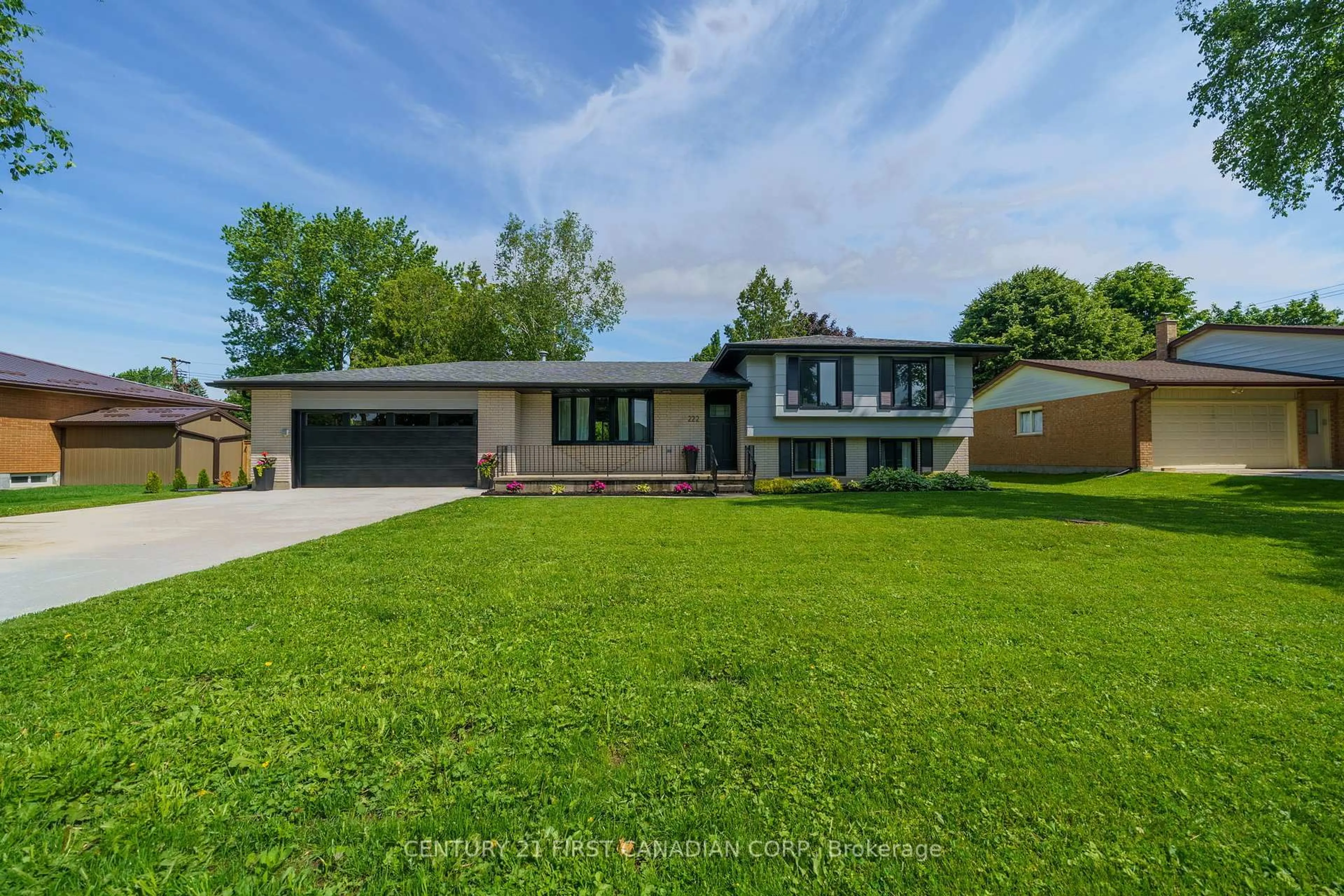 A pic from outside/outdoor area/front of a property/back of a property/a pic from drone, street for 222 CHURCHILL Dr, South Huron Ontario N0M 1S1