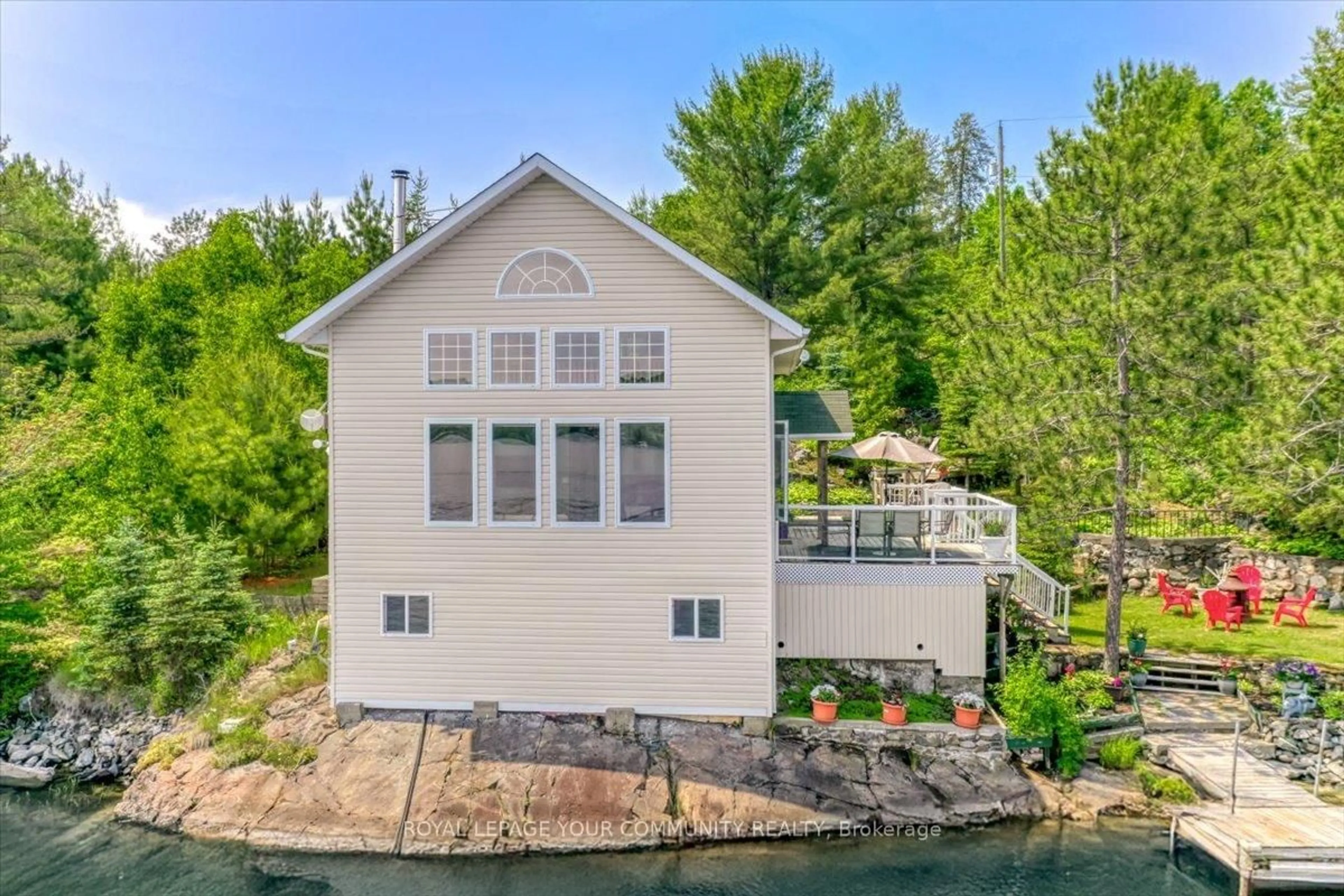A pic from outside/outdoor area/front of a property/back of a property/a pic from drone, water/lake/river/ocean view for 70 Clark Rd, Greater Sudbury Ontario P3Y 1H8