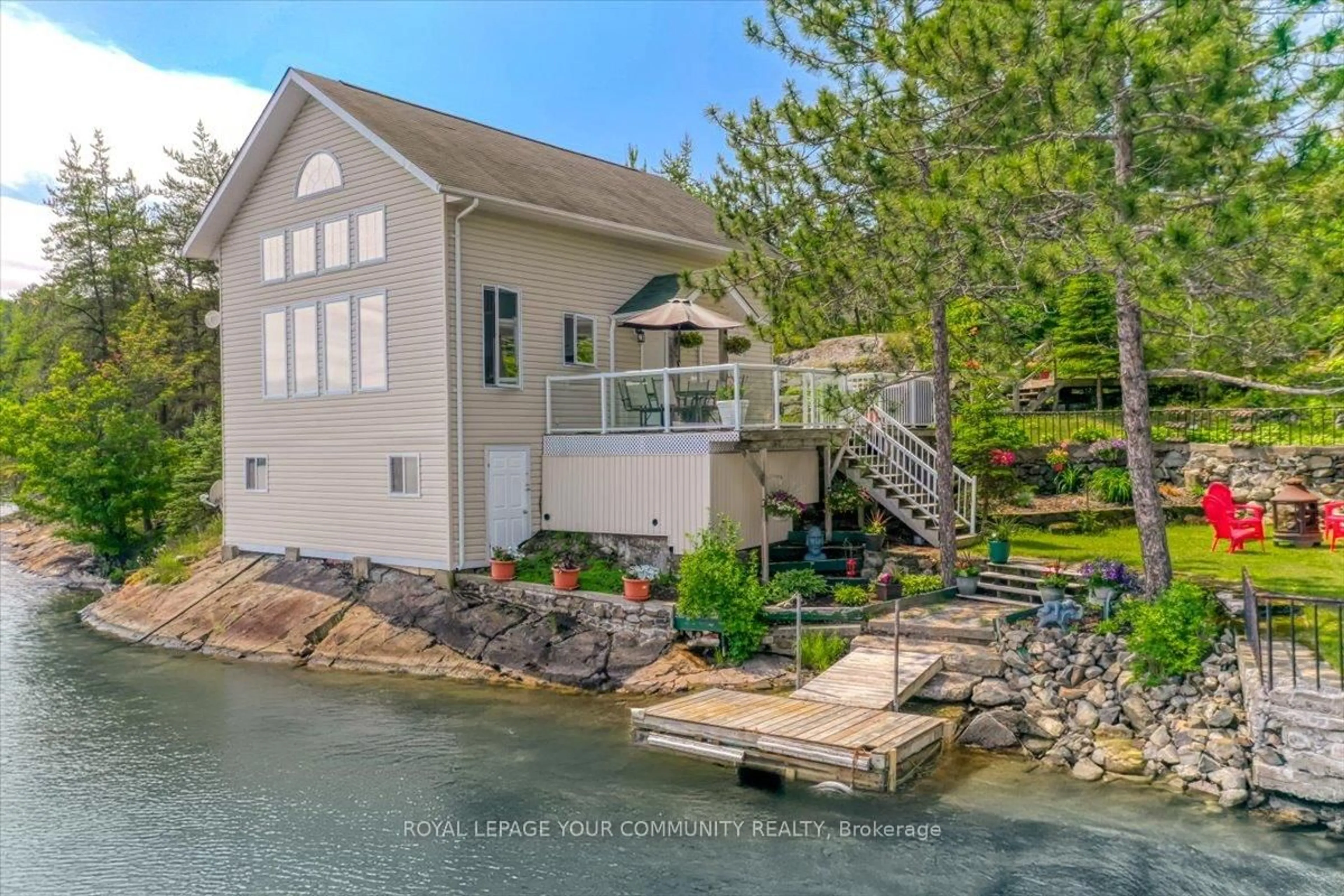 A pic from outside/outdoor area/front of a property/back of a property/a pic from drone, water/lake/river/ocean view for 70 Clark Rd, Greater Sudbury Ontario P3Y 1H8