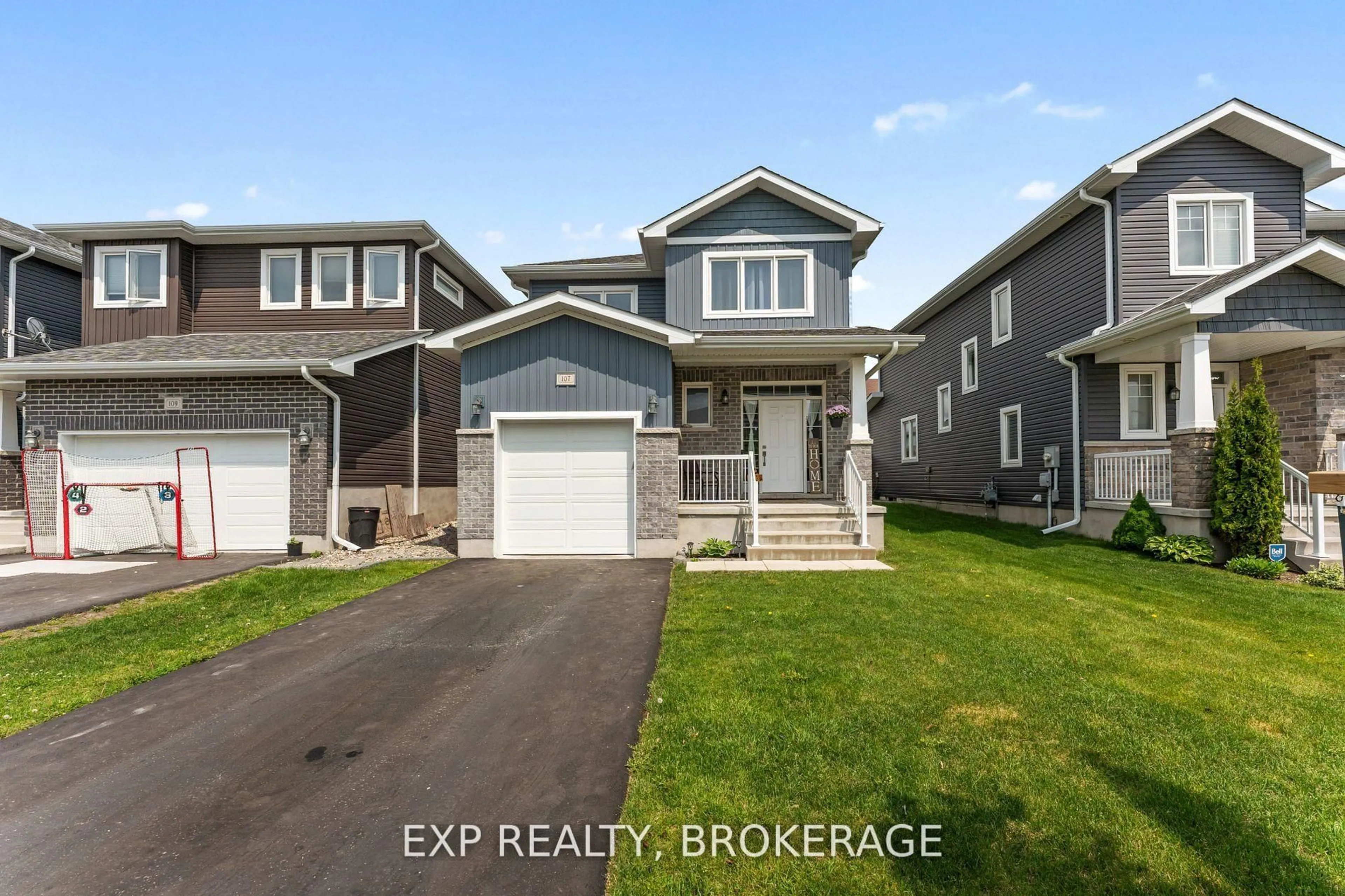 Home with vinyl exterior material, street for 107 Hazlett St, Loyalist Ontario K7N 0C1