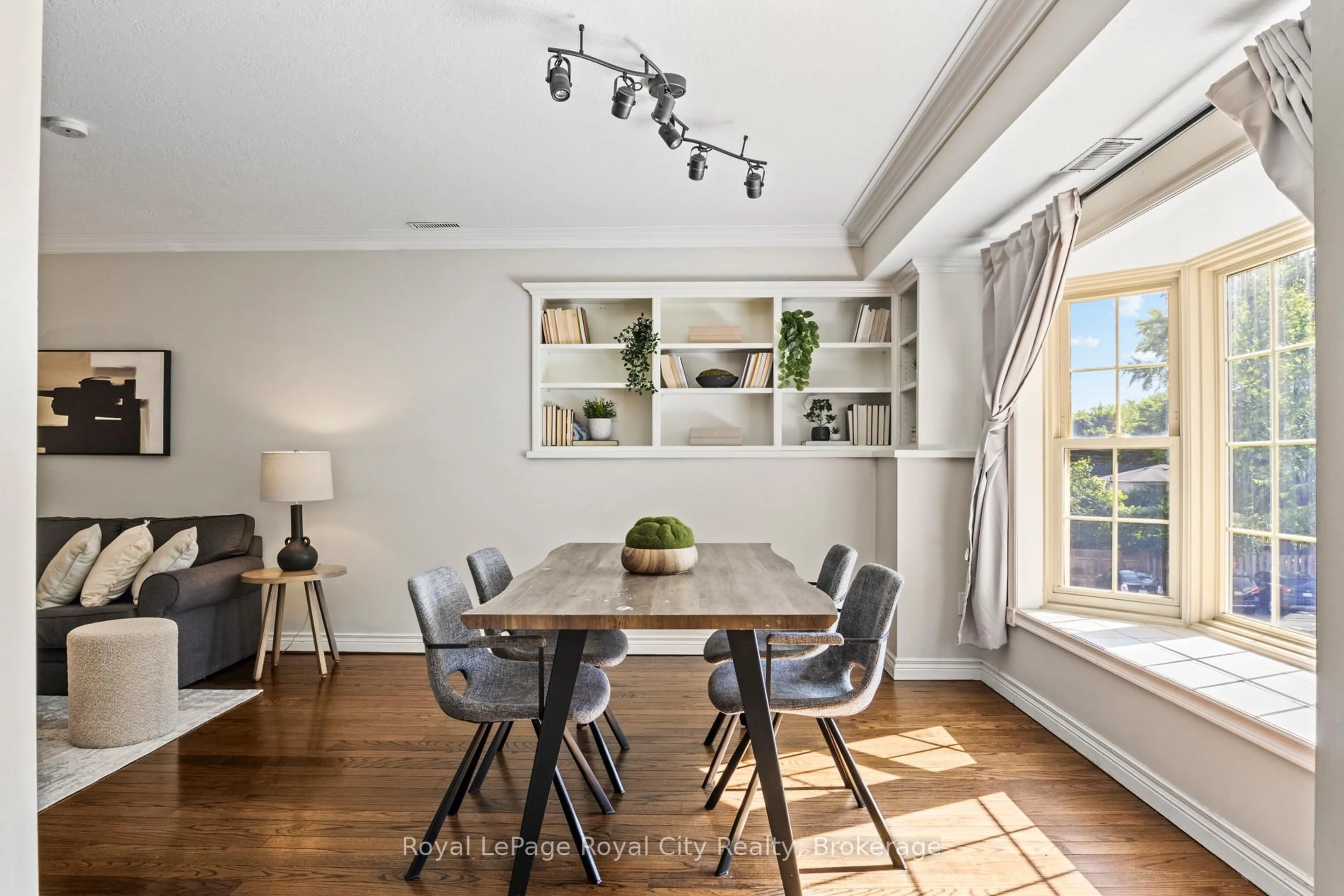 Dining room, wood/laminate floor for 360 Waterloo Ave #209, Guelph Ontario N1H 7Y3