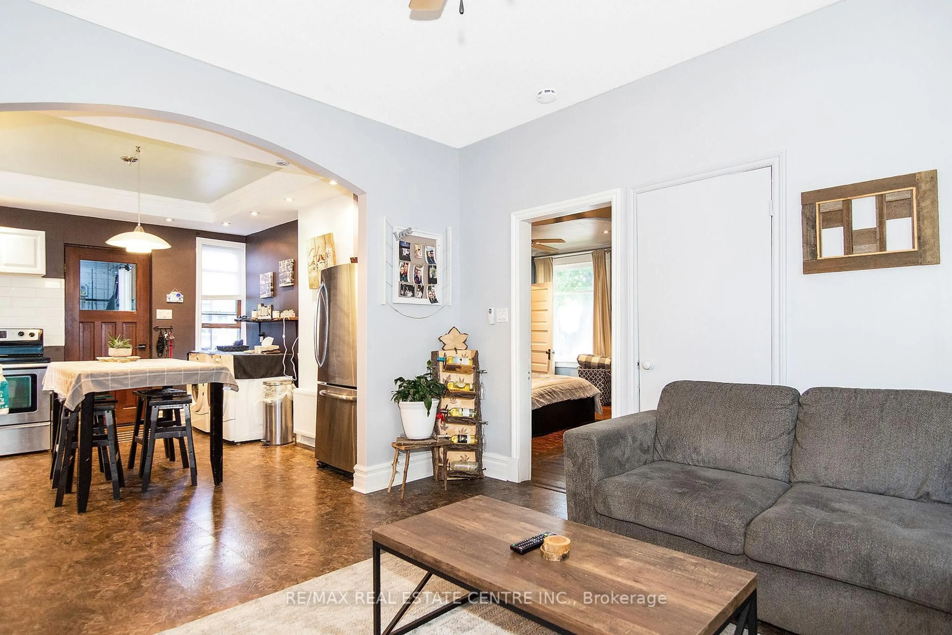 Living room with furniture, wood/laminate floor for 132 First Ave, Shelburne Ontario L9V 3K1