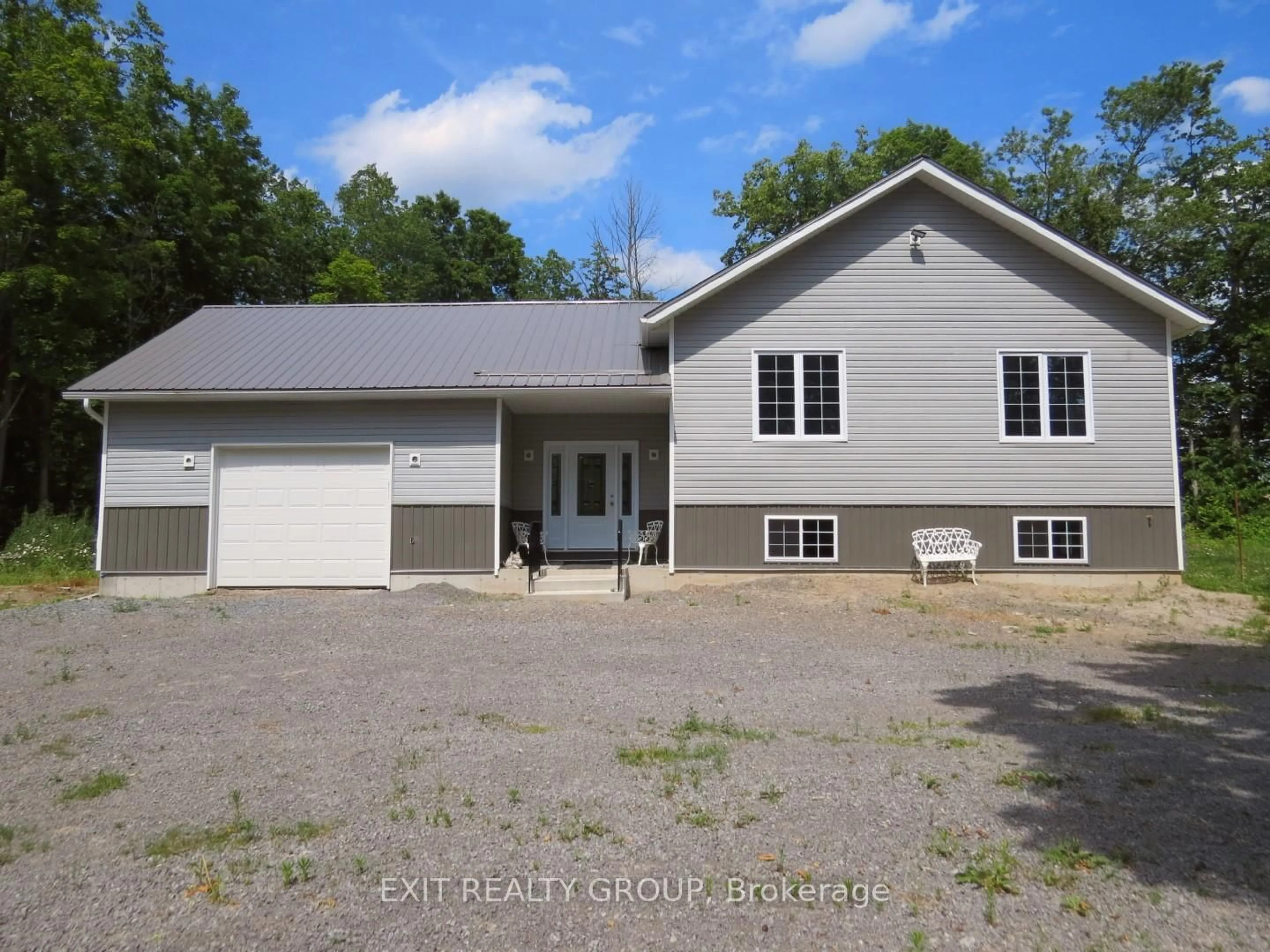 A pic from outside/outdoor area/front of a property/back of a property/a pic from drone, unknown for 325 Douglas Rd, Madoc Ontario K0K 2K0