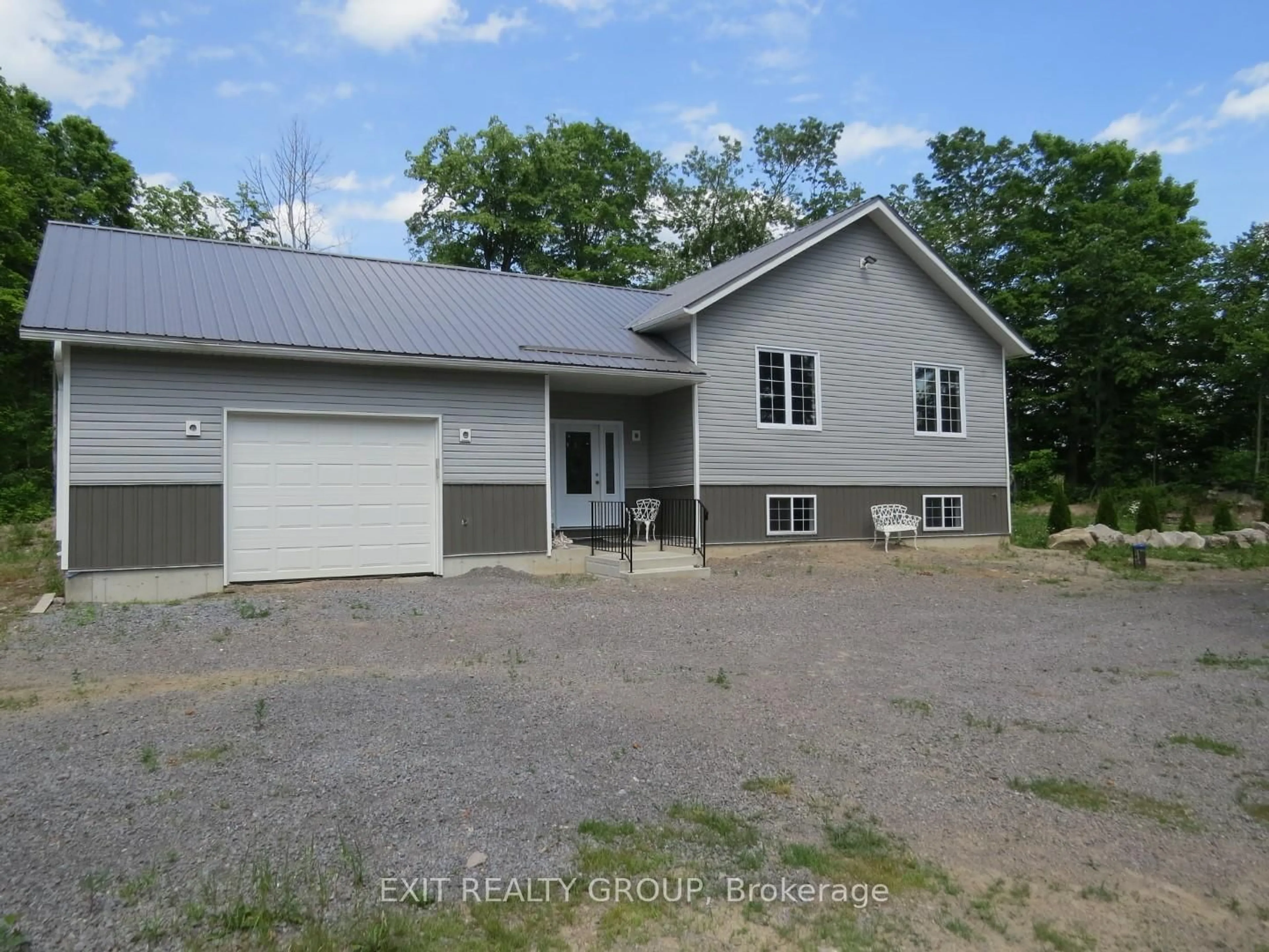 A pic from outside/outdoor area/front of a property/back of a property/a pic from drone, street for 325 Douglas Rd, Madoc Ontario K0K 2K0