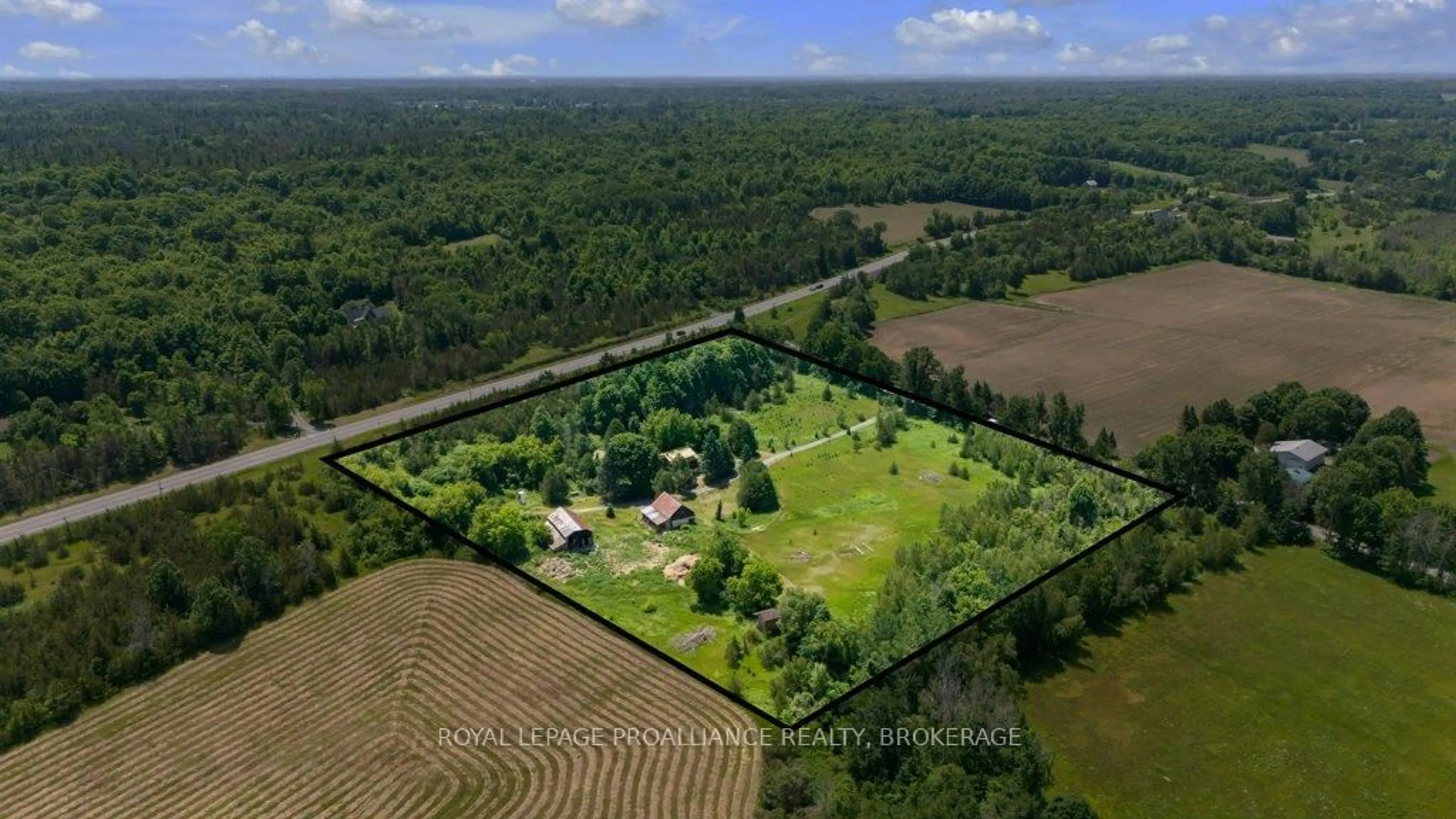 A pic from outside/outdoor area/front of a property/back of a property/a pic from drone, forest/trees view for 25 Curl Rd, Yarker Ontario K0K 3N0