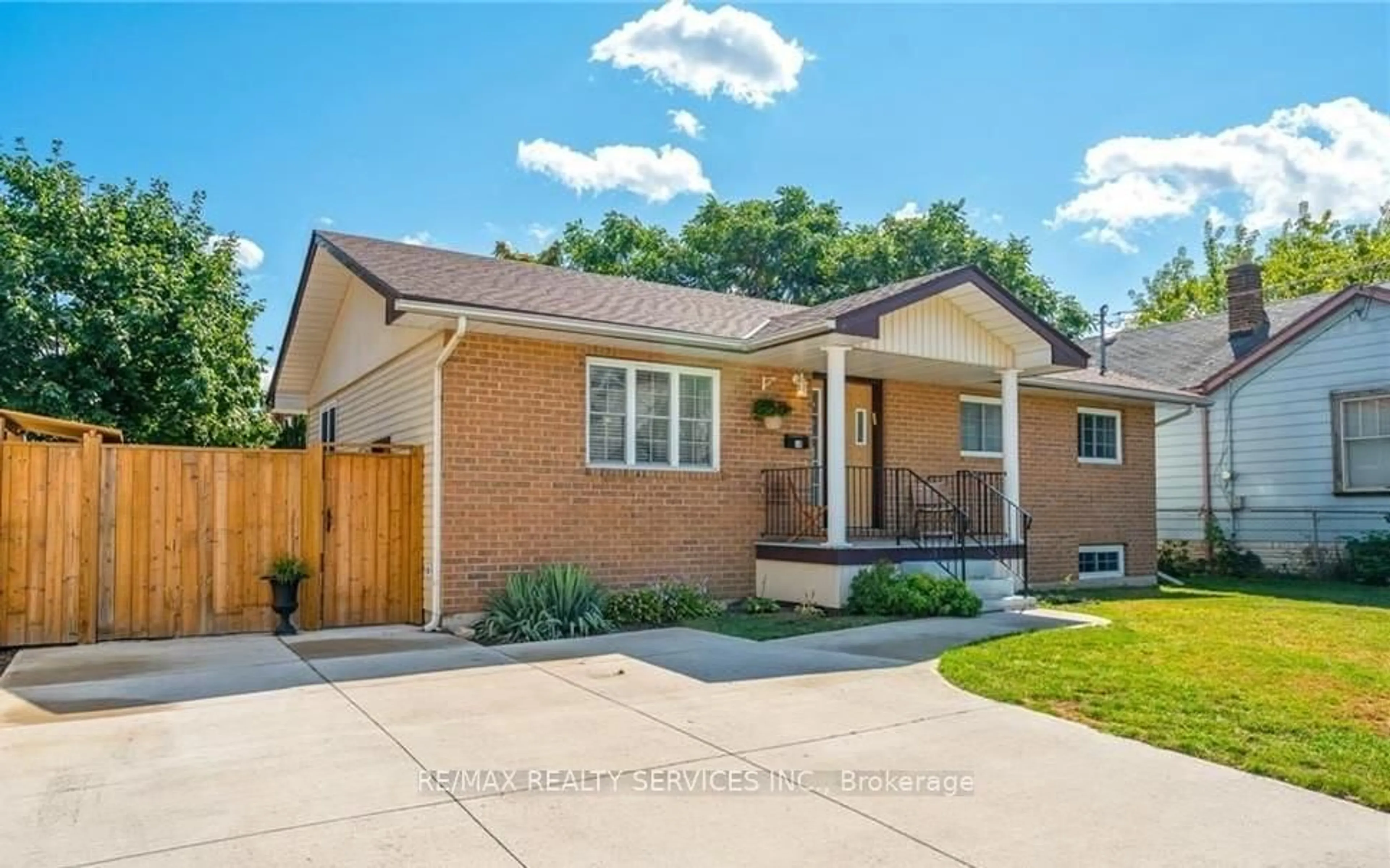 Home with brick exterior material, street for 18 Greenlaw Pl, St. Catharines Ontario L2R 4S6