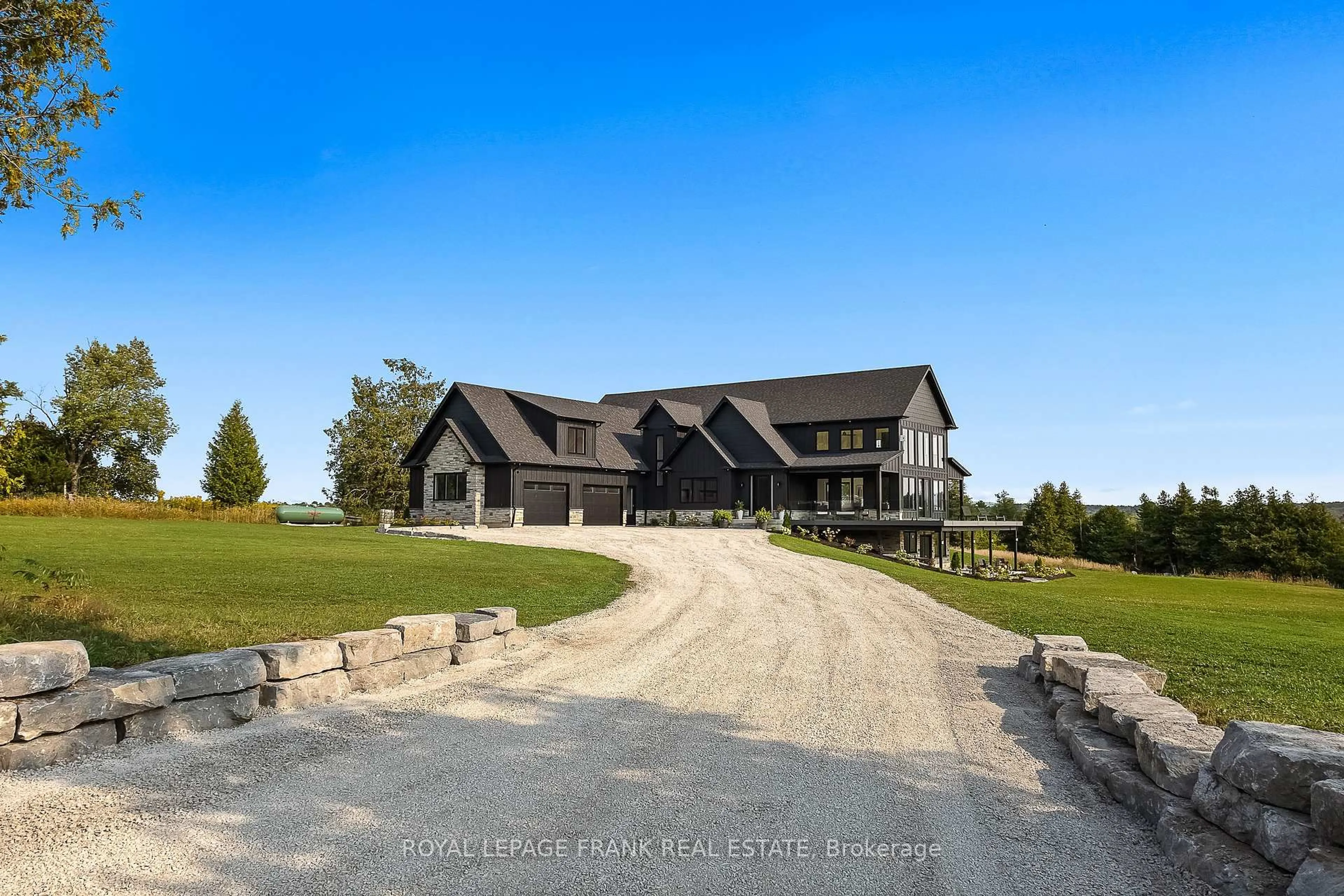 A pic from outside/outdoor area/front of a property/back of a property/a pic from drone, unknown for 27 Morton Line, Cavan Monaghan Ontario L0A 1C0